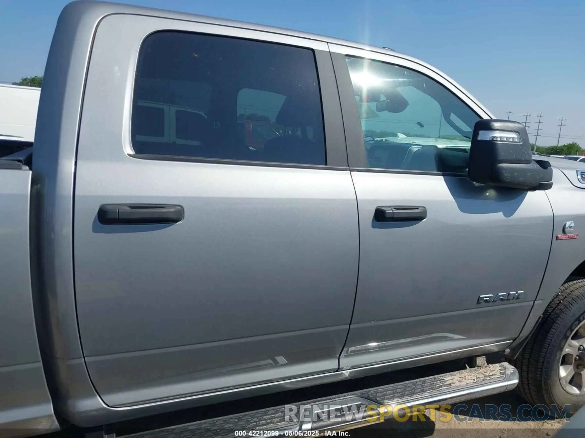 13 Photograph of a damaged car 3C6UR5DL4RG296228 RAM 2500 2024