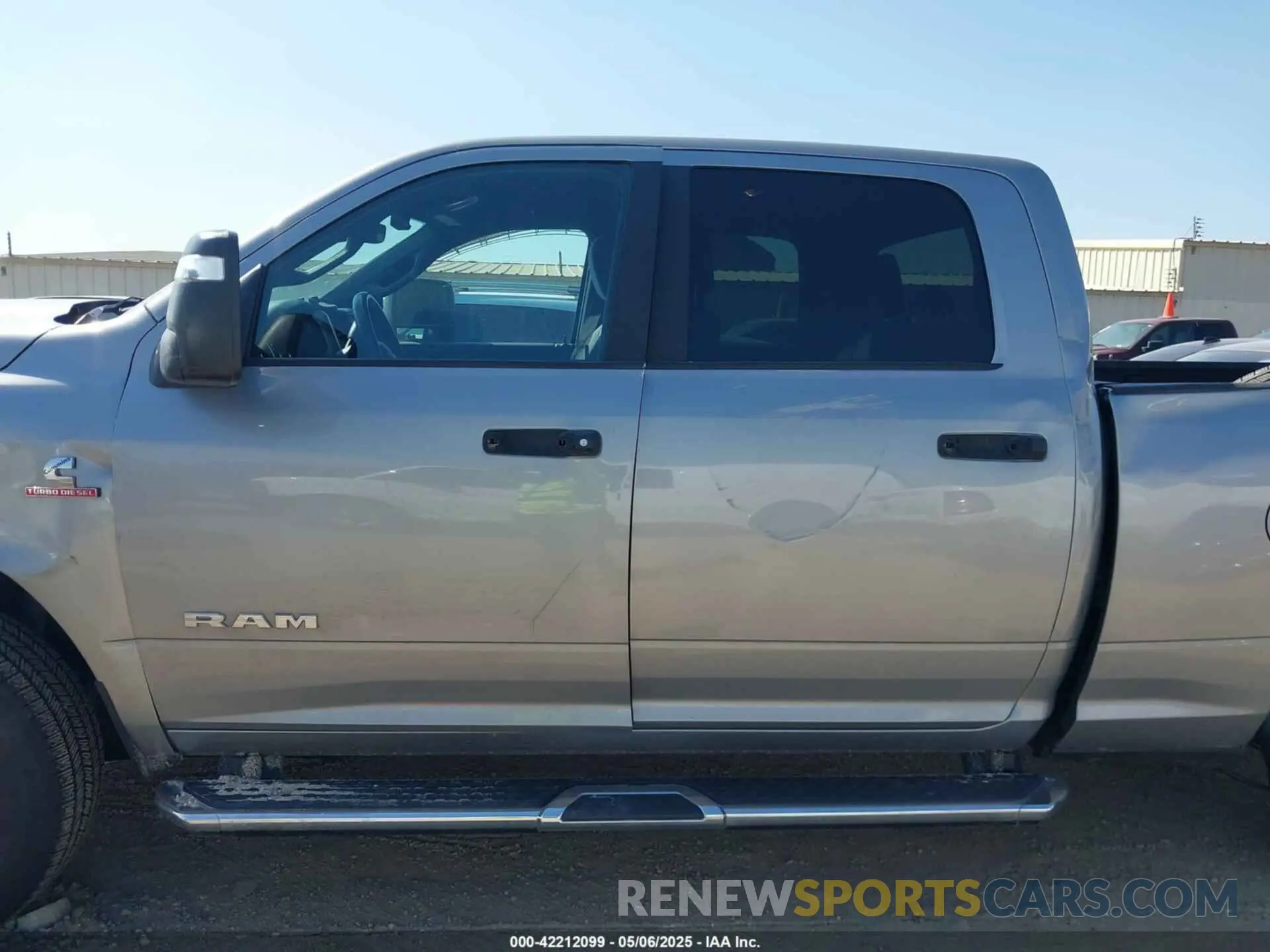 14 Photograph of a damaged car 3C6UR5DL4RG296228 RAM 2500 2024
