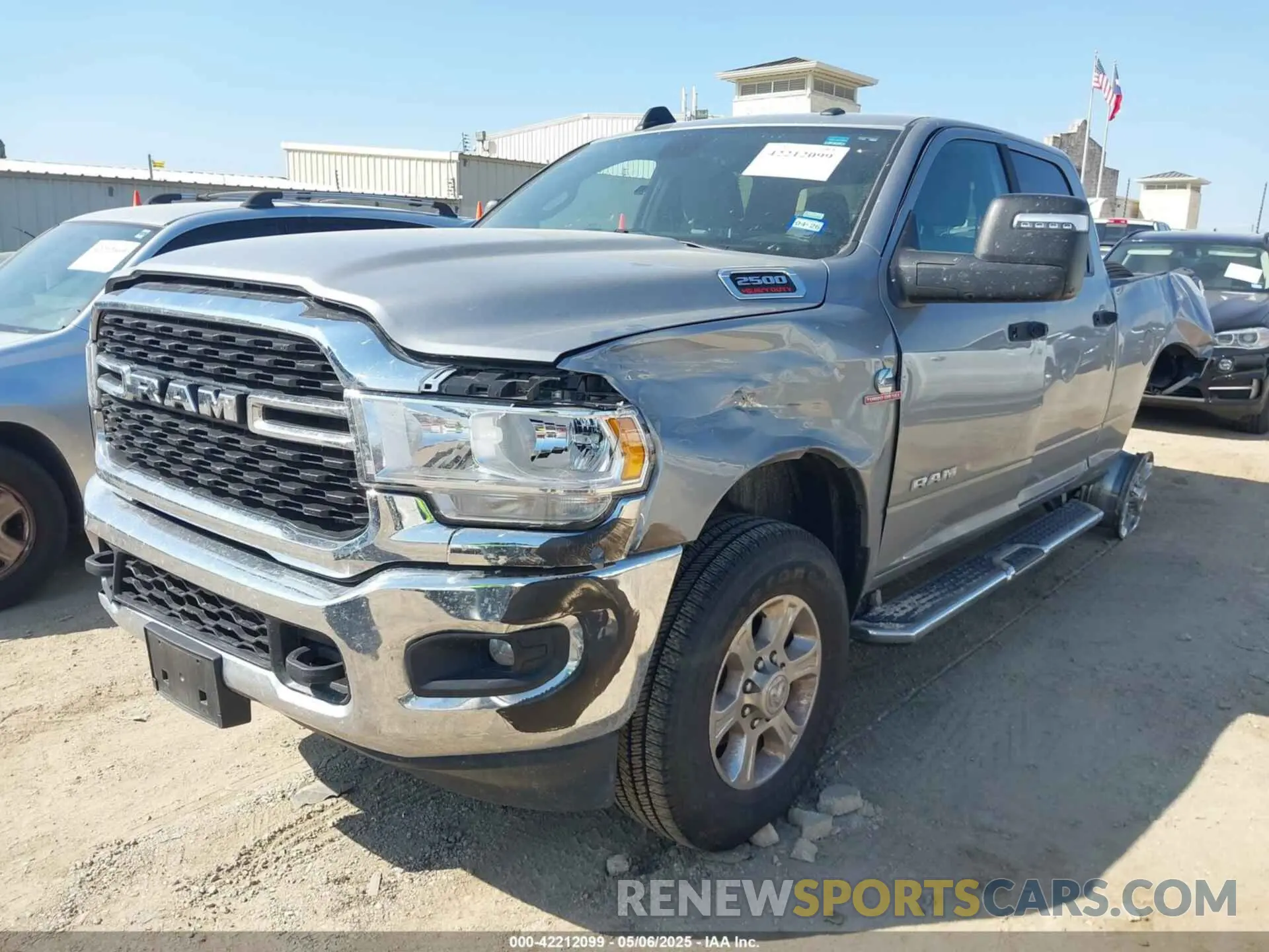 2 Photograph of a damaged car 3C6UR5DL4RG296228 RAM 2500 2024