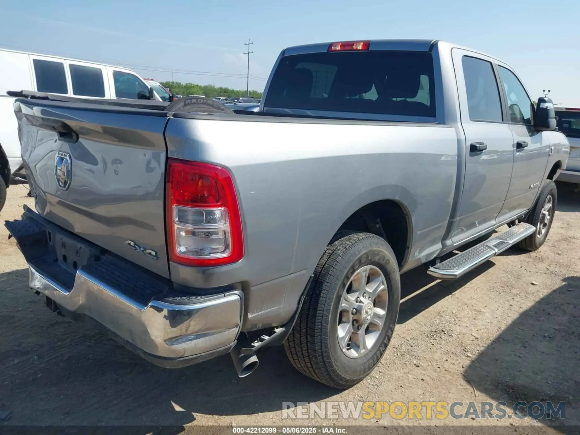 4 Photograph of a damaged car 3C6UR5DL4RG296228 RAM 2500 2024