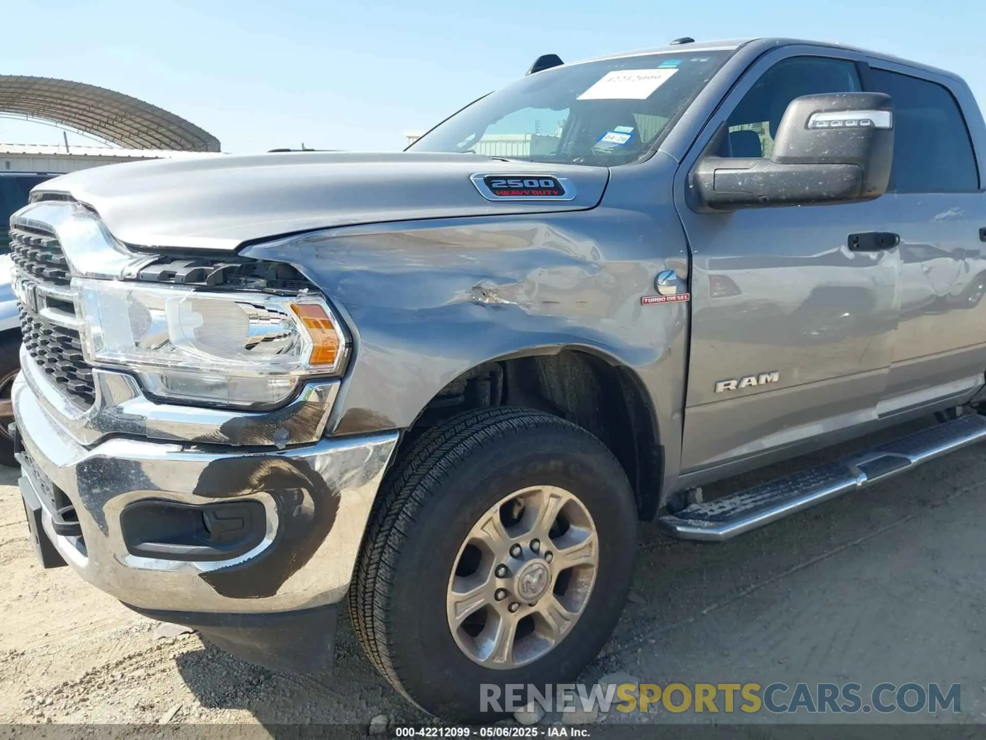 6 Photograph of a damaged car 3C6UR5DL4RG296228 RAM 2500 2024