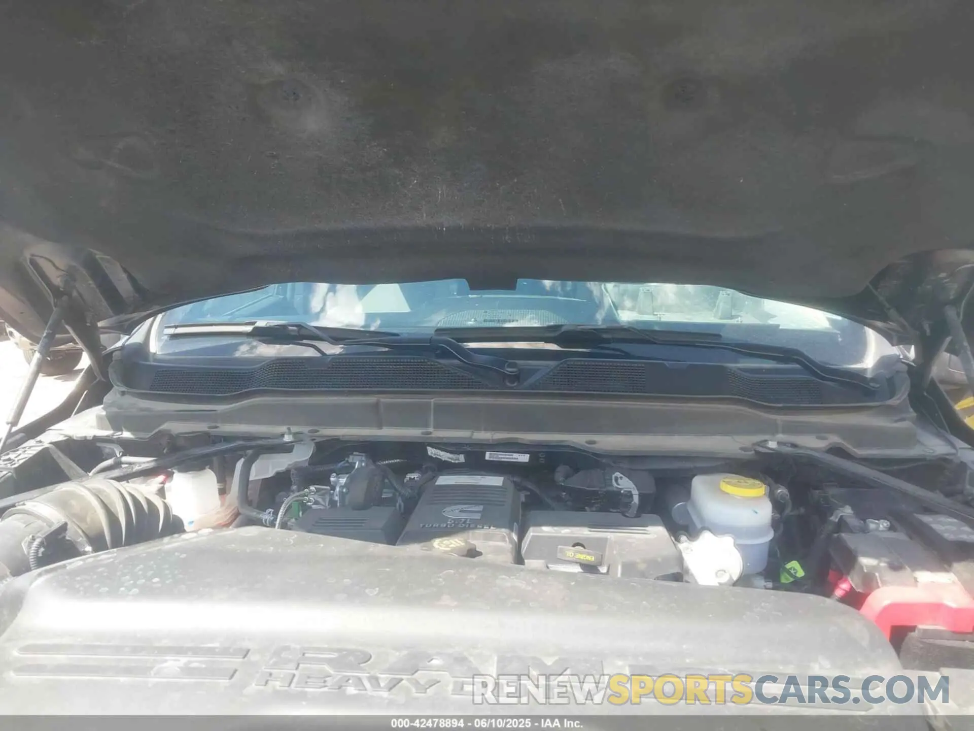 10 Photograph of a damaged car 3C6UR5DL4RG303677 RAM 2500 2024