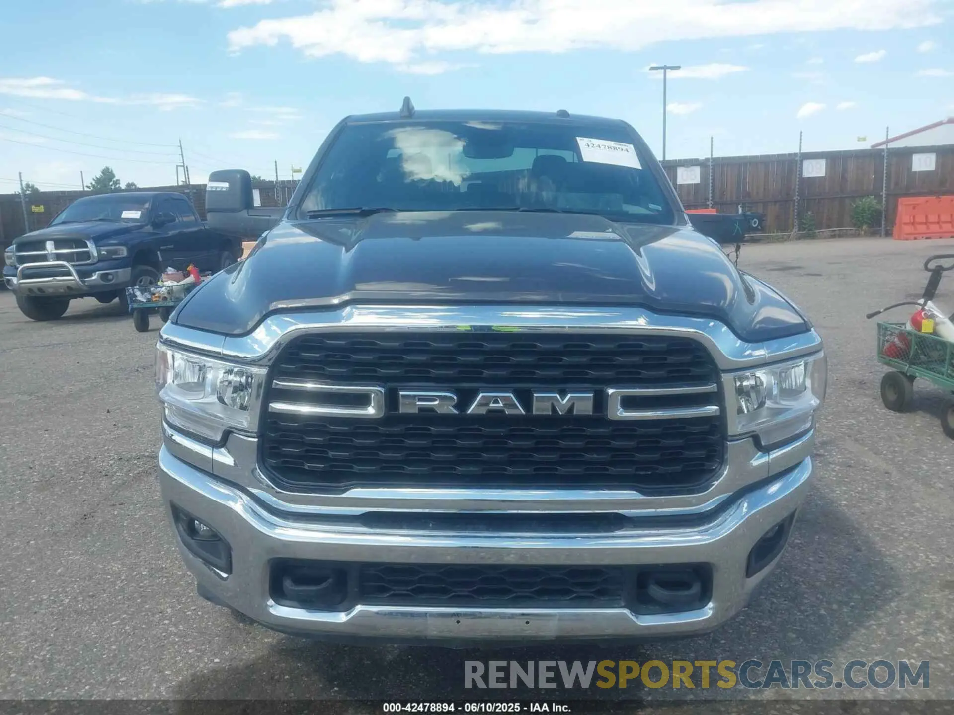 12 Photograph of a damaged car 3C6UR5DL4RG303677 RAM 2500 2024