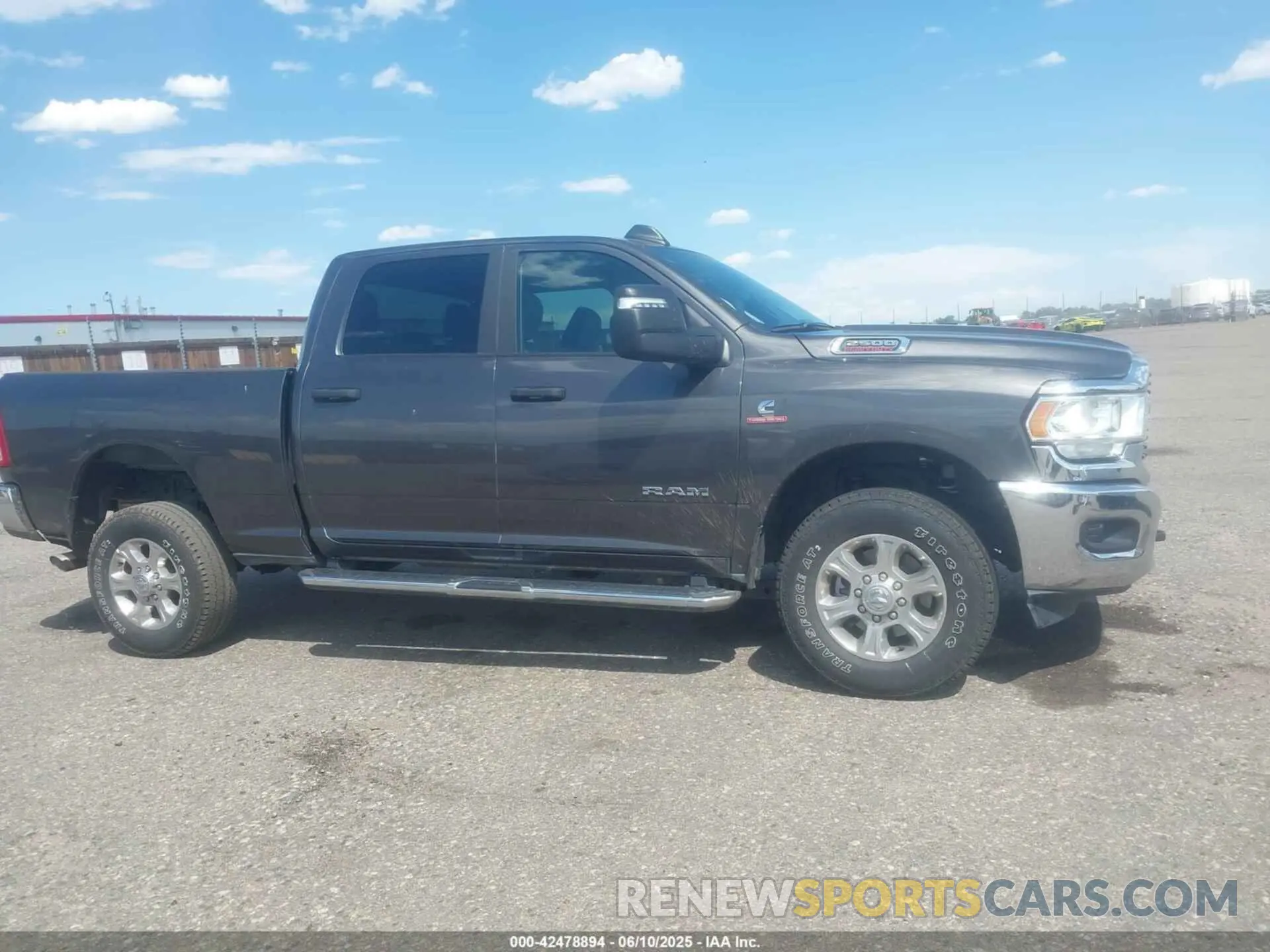 13 Photograph of a damaged car 3C6UR5DL4RG303677 RAM 2500 2024