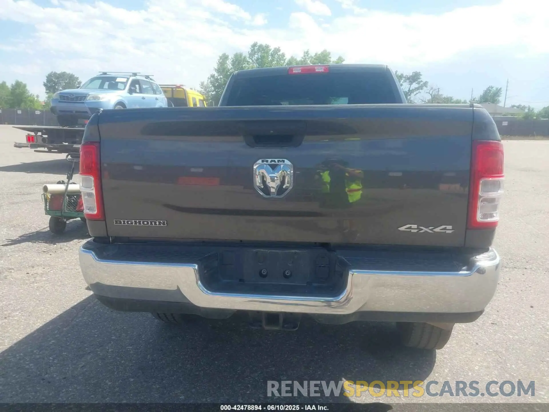 16 Photograph of a damaged car 3C6UR5DL4RG303677 RAM 2500 2024
