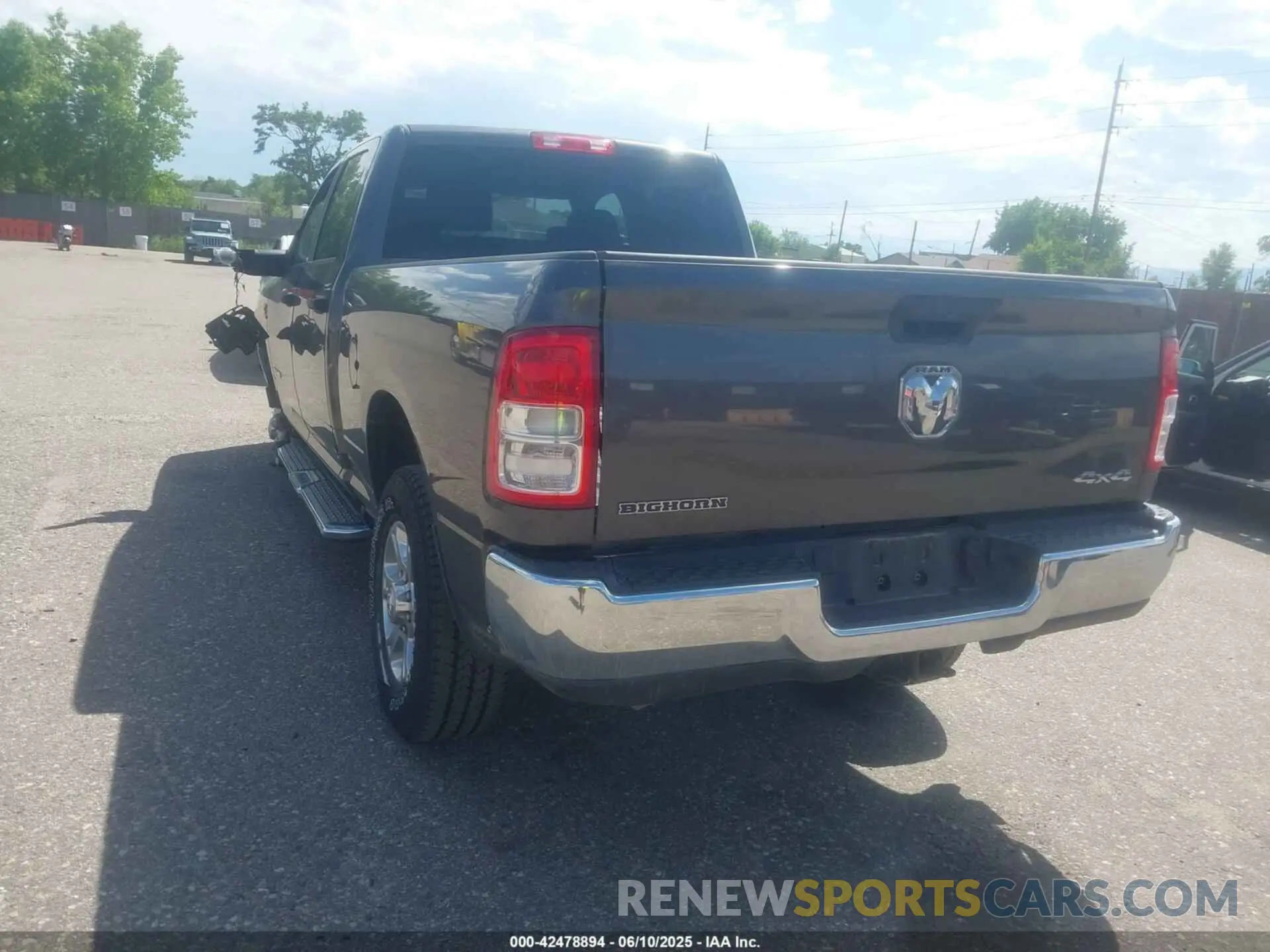 3 Photograph of a damaged car 3C6UR5DL4RG303677 RAM 2500 2024
