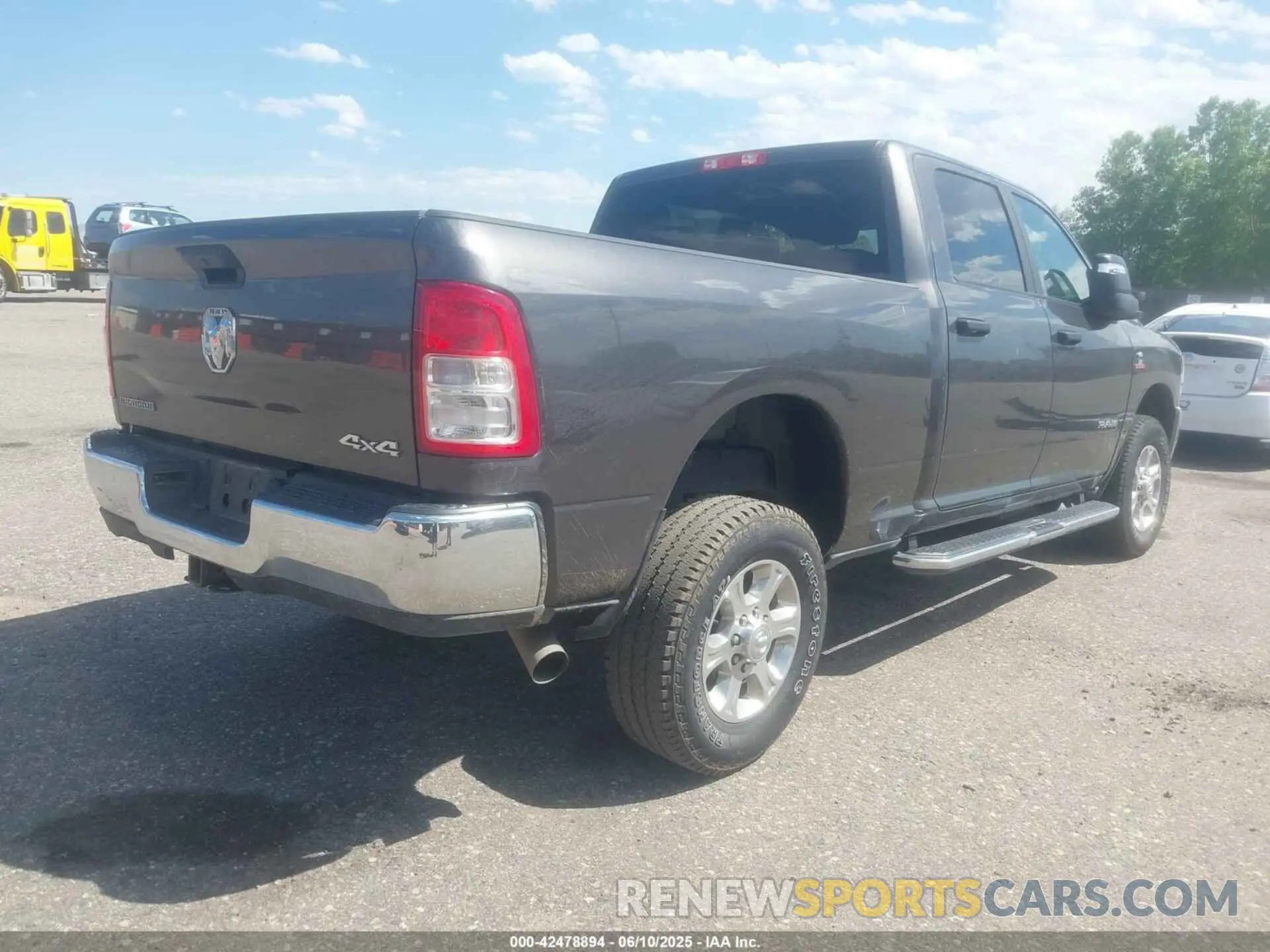 4 Photograph of a damaged car 3C6UR5DL4RG303677 RAM 2500 2024