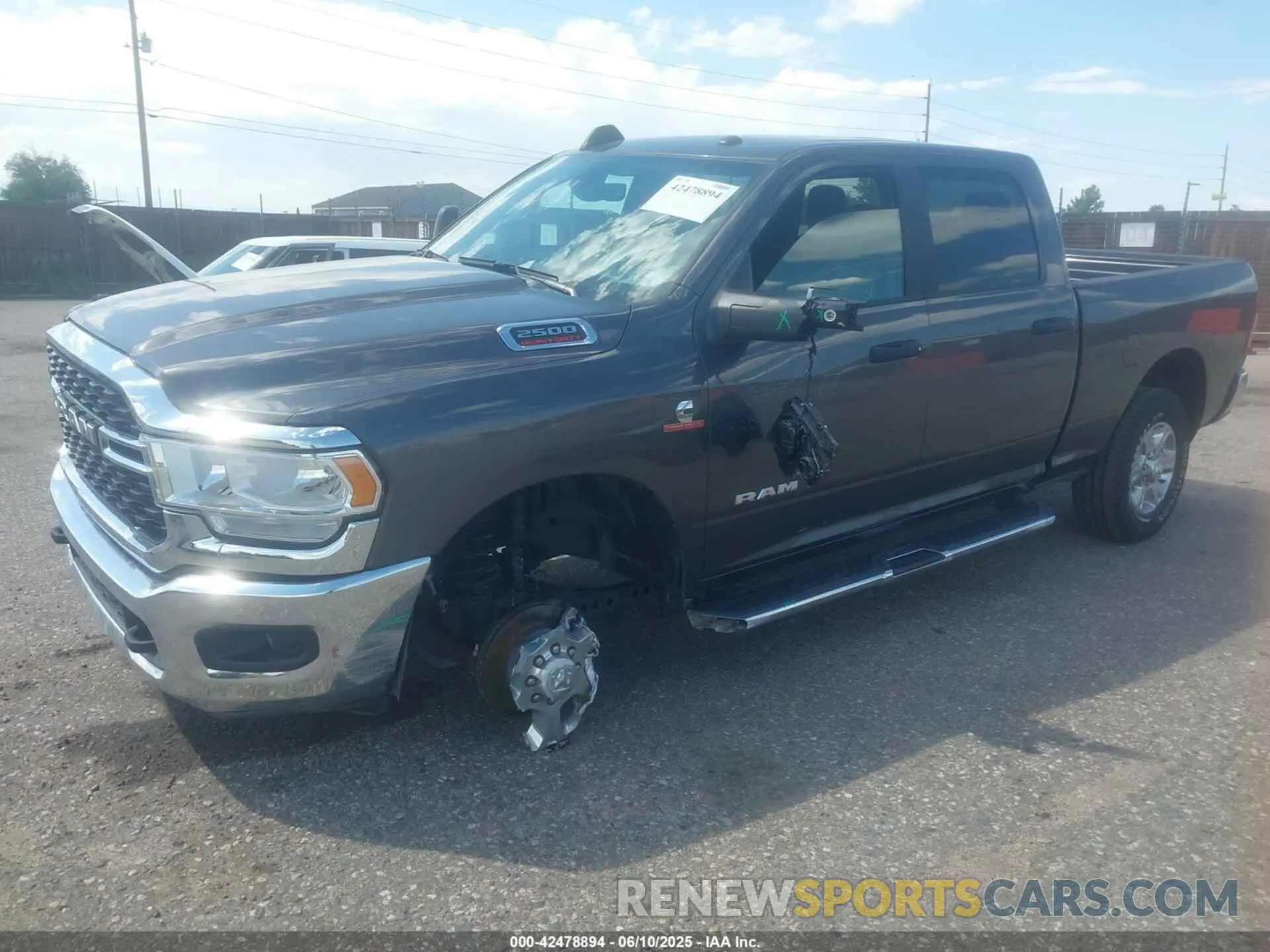 6 Photograph of a damaged car 3C6UR5DL4RG303677 RAM 2500 2024