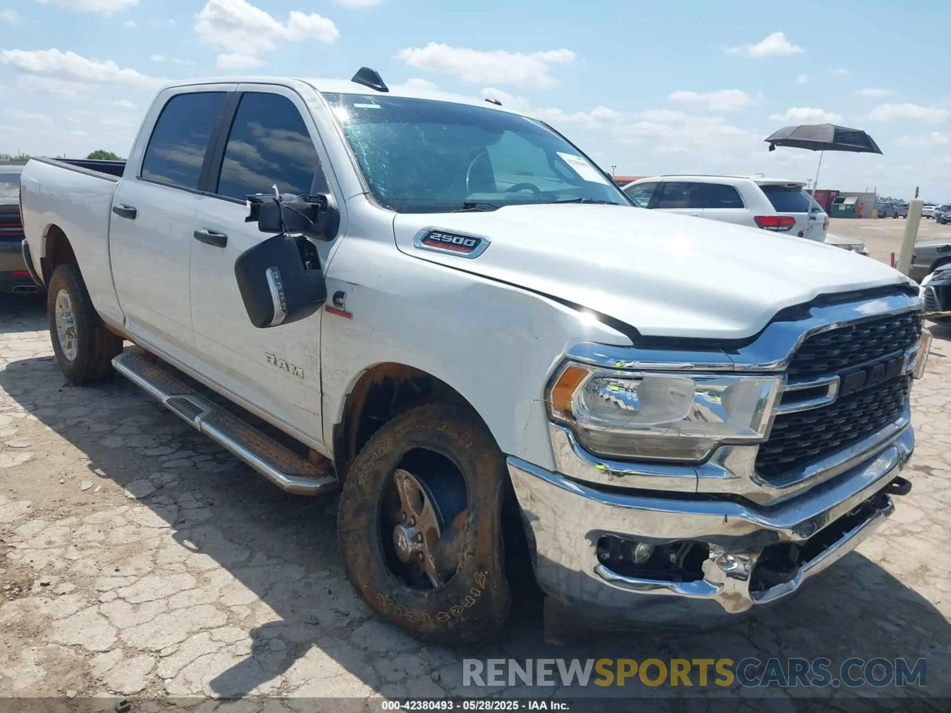 1 Photograph of a damaged car 3C6UR5DL4RG338638 RAM 2500 2024