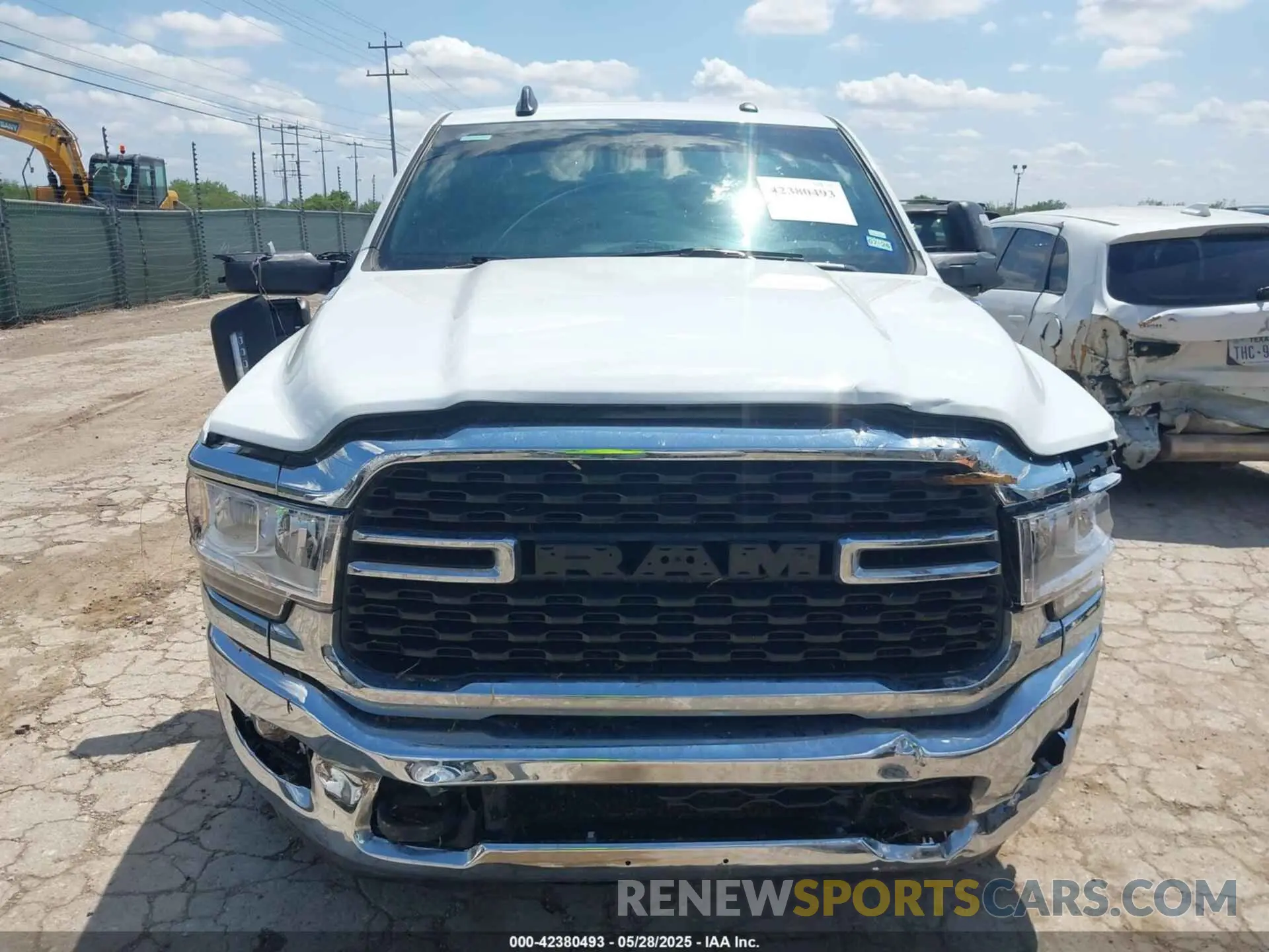 11 Photograph of a damaged car 3C6UR5DL4RG338638 RAM 2500 2024