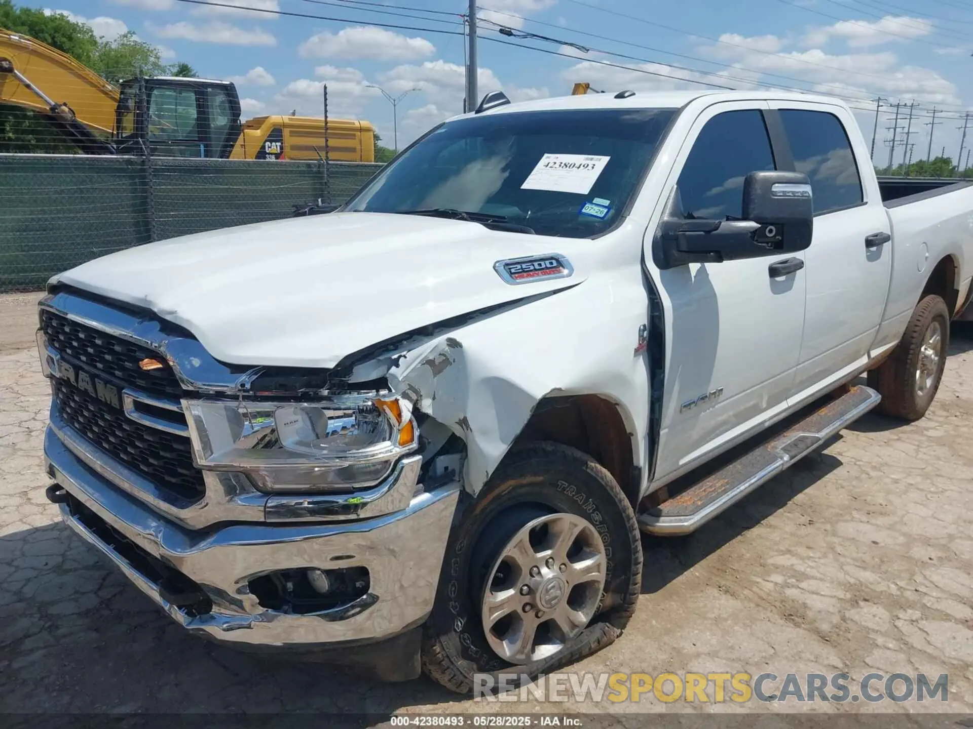 2 Photograph of a damaged car 3C6UR5DL4RG338638 RAM 2500 2024