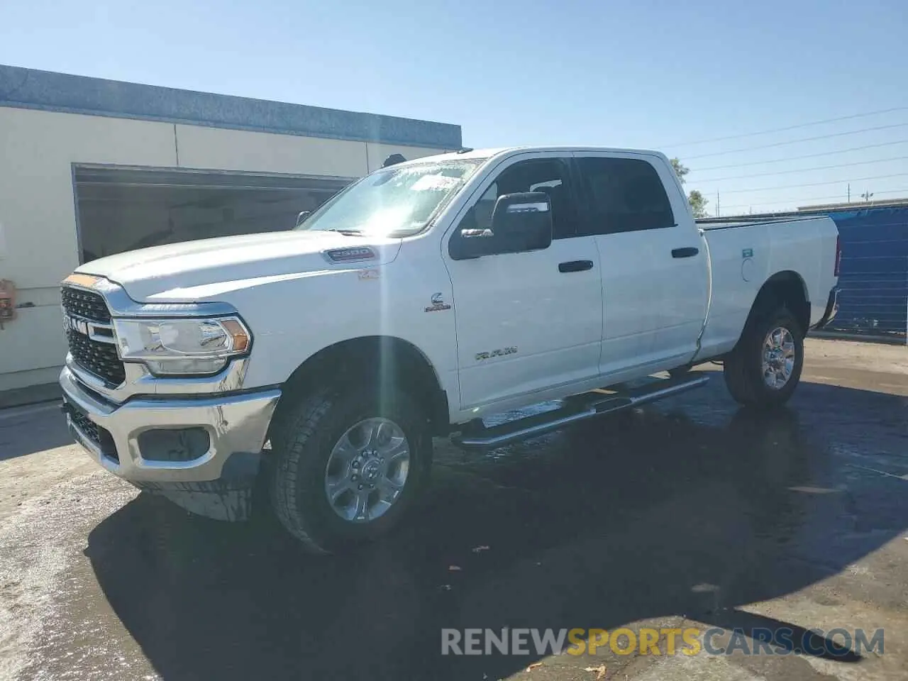 1 Photograph of a damaged car 3C6UR5DL5RG100958 RAM 2500 2024
