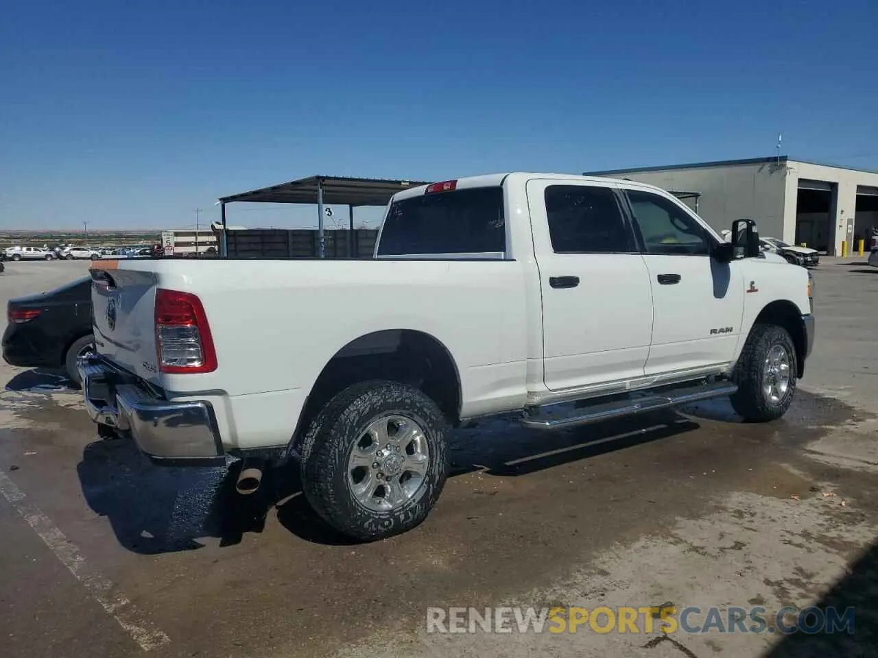 3 Photograph of a damaged car 3C6UR5DL5RG100958 RAM 2500 2024
