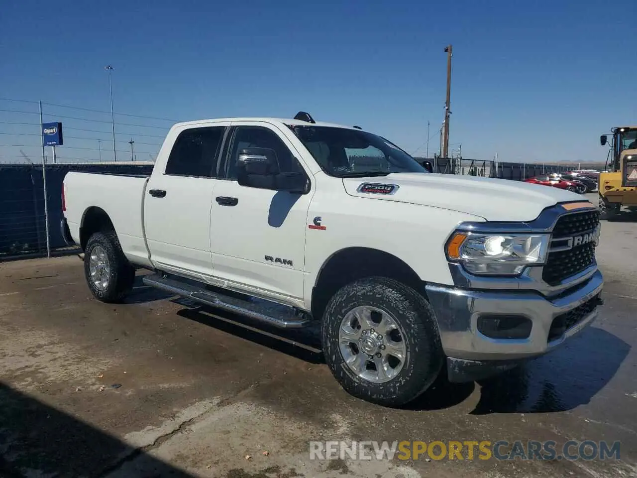 4 Photograph of a damaged car 3C6UR5DL5RG100958 RAM 2500 2024