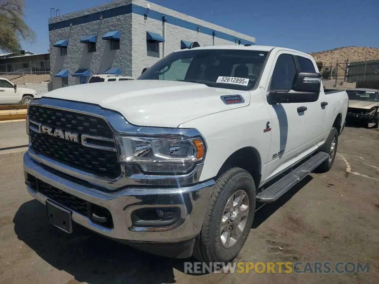 1 Photograph of a damaged car 3C6UR5DL5RG130641 RAM 2500 2024