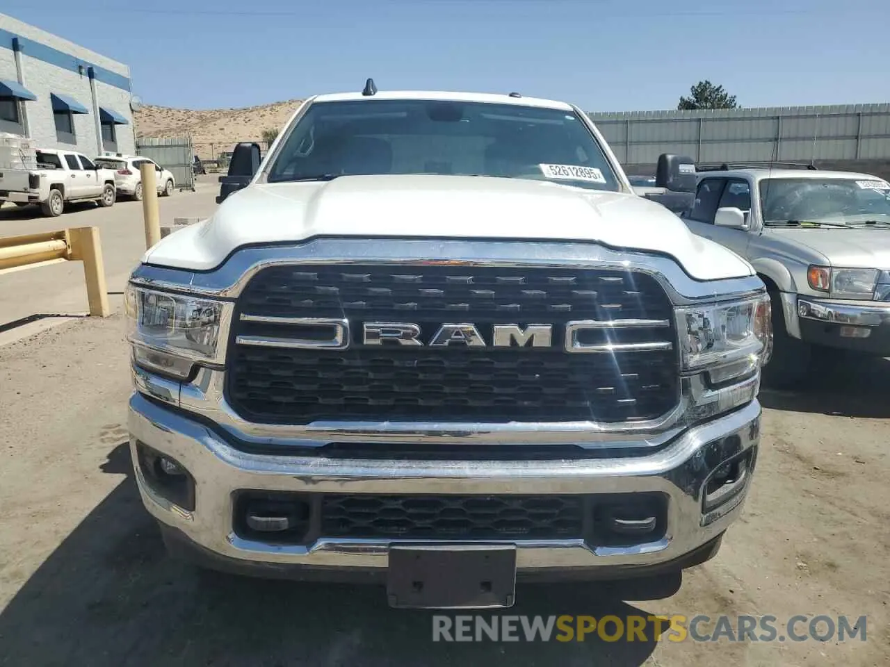 5 Photograph of a damaged car 3C6UR5DL5RG130641 RAM 2500 2024
