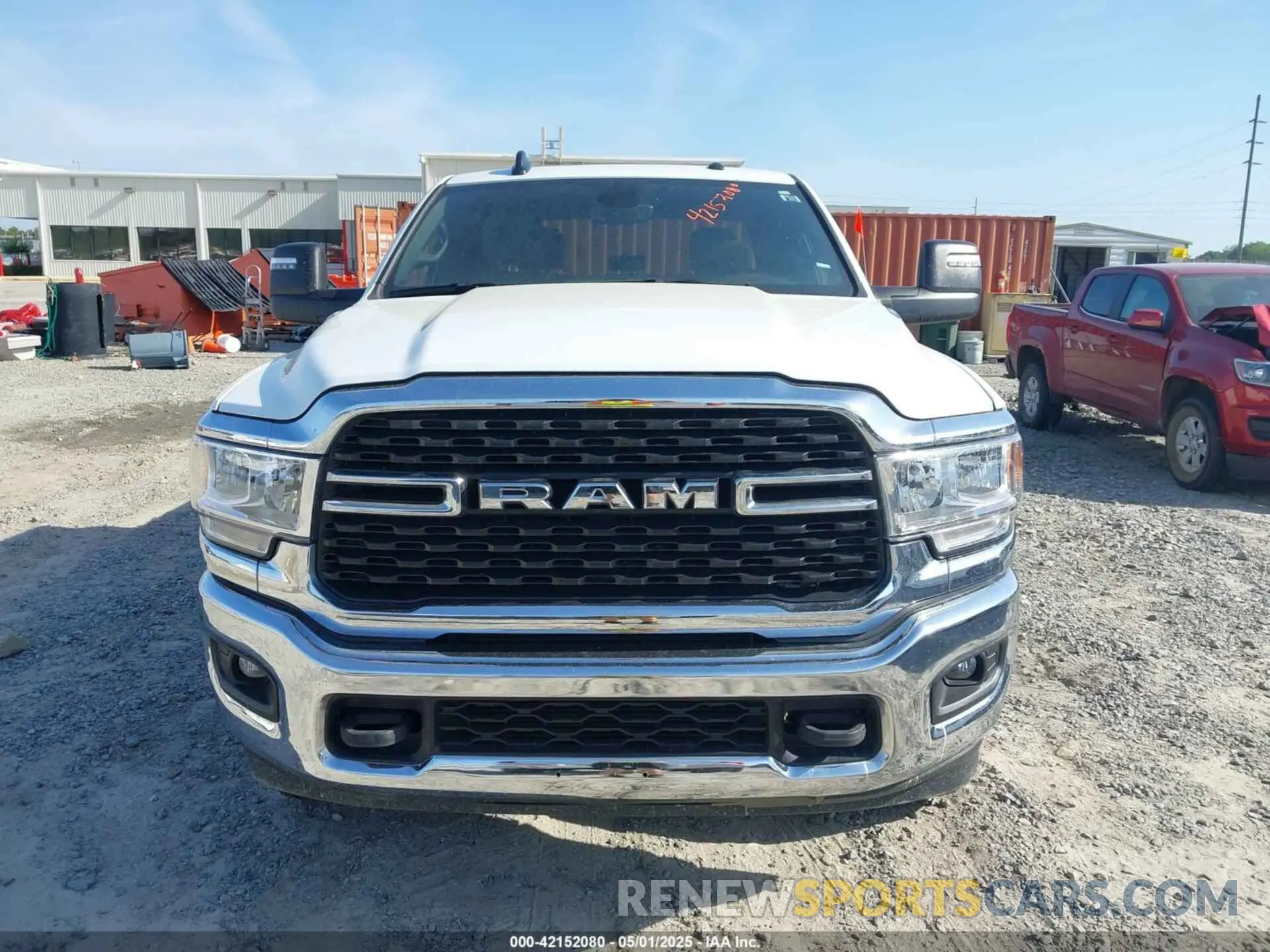 12 Photograph of a damaged car 3C6UR5DL5RG291586 RAM 2500 2024