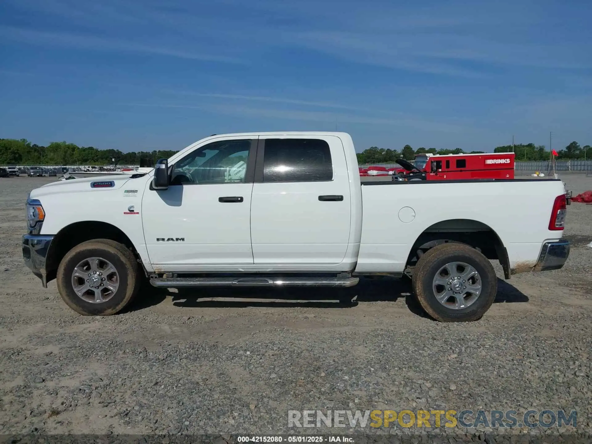 14 Photograph of a damaged car 3C6UR5DL5RG291586 RAM 2500 2024