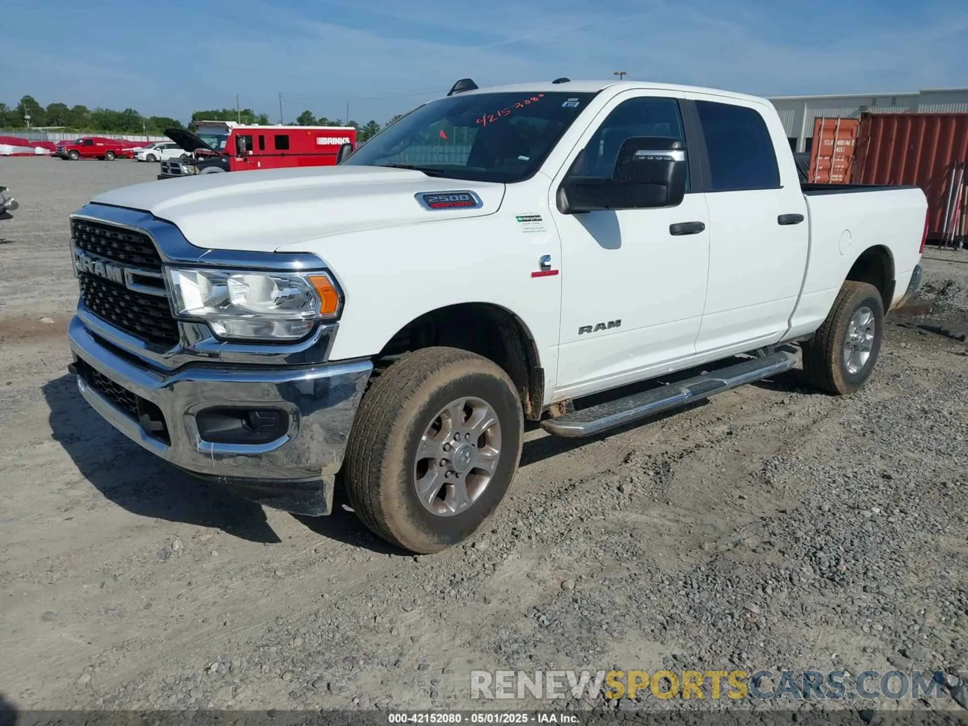 2 Photograph of a damaged car 3C6UR5DL5RG291586 RAM 2500 2024