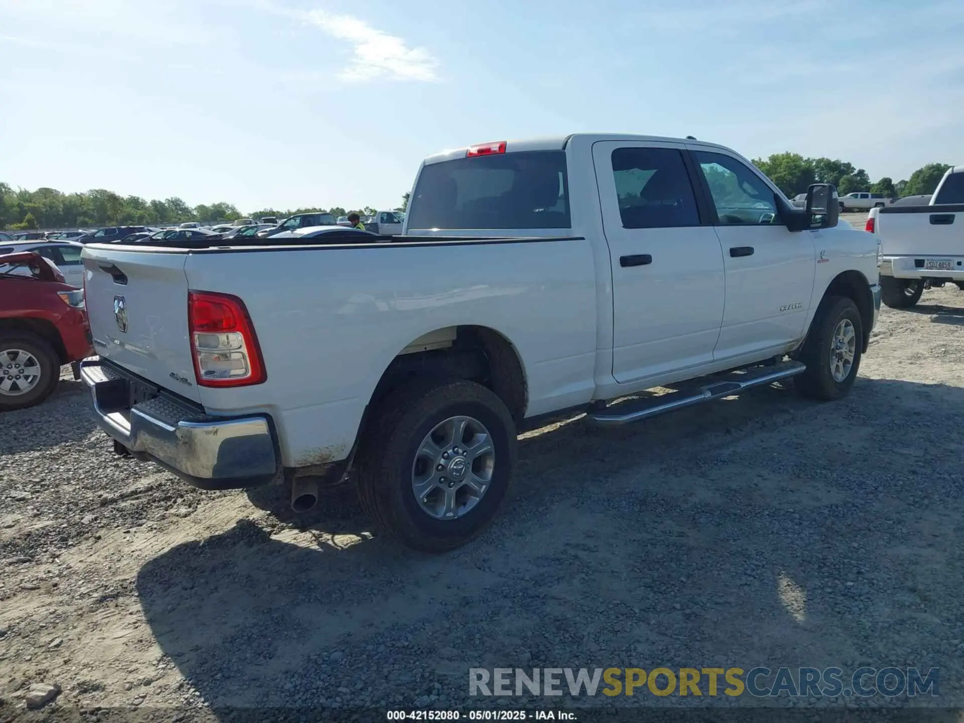 4 Photograph of a damaged car 3C6UR5DL5RG291586 RAM 2500 2024