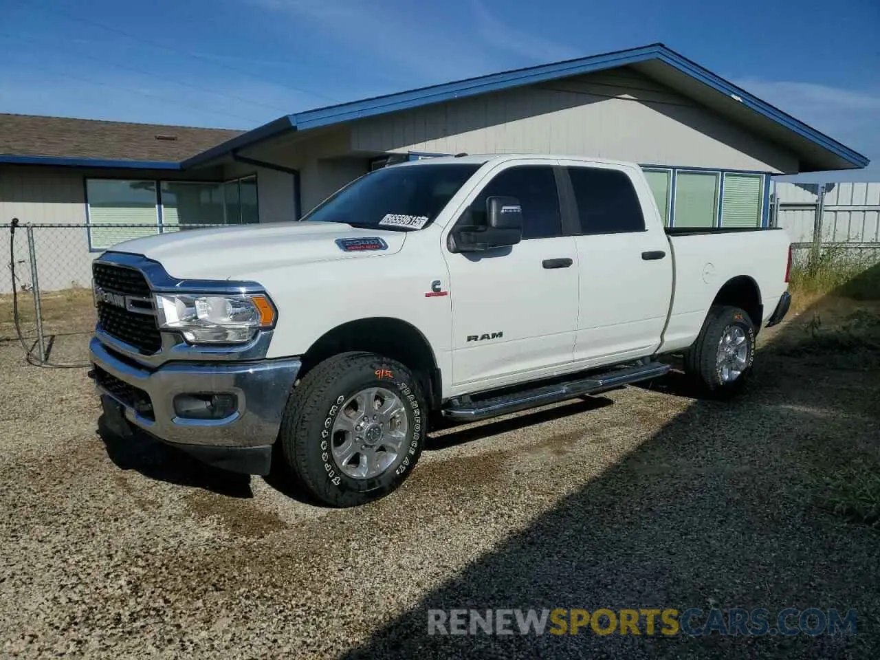1 Photograph of a damaged car 3C6UR5DL5RG338356 RAM 2500 2024