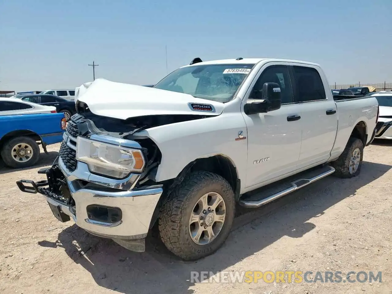 1 Photograph of a damaged car 3C6UR5DL6RG105991 RAM 2500 2024