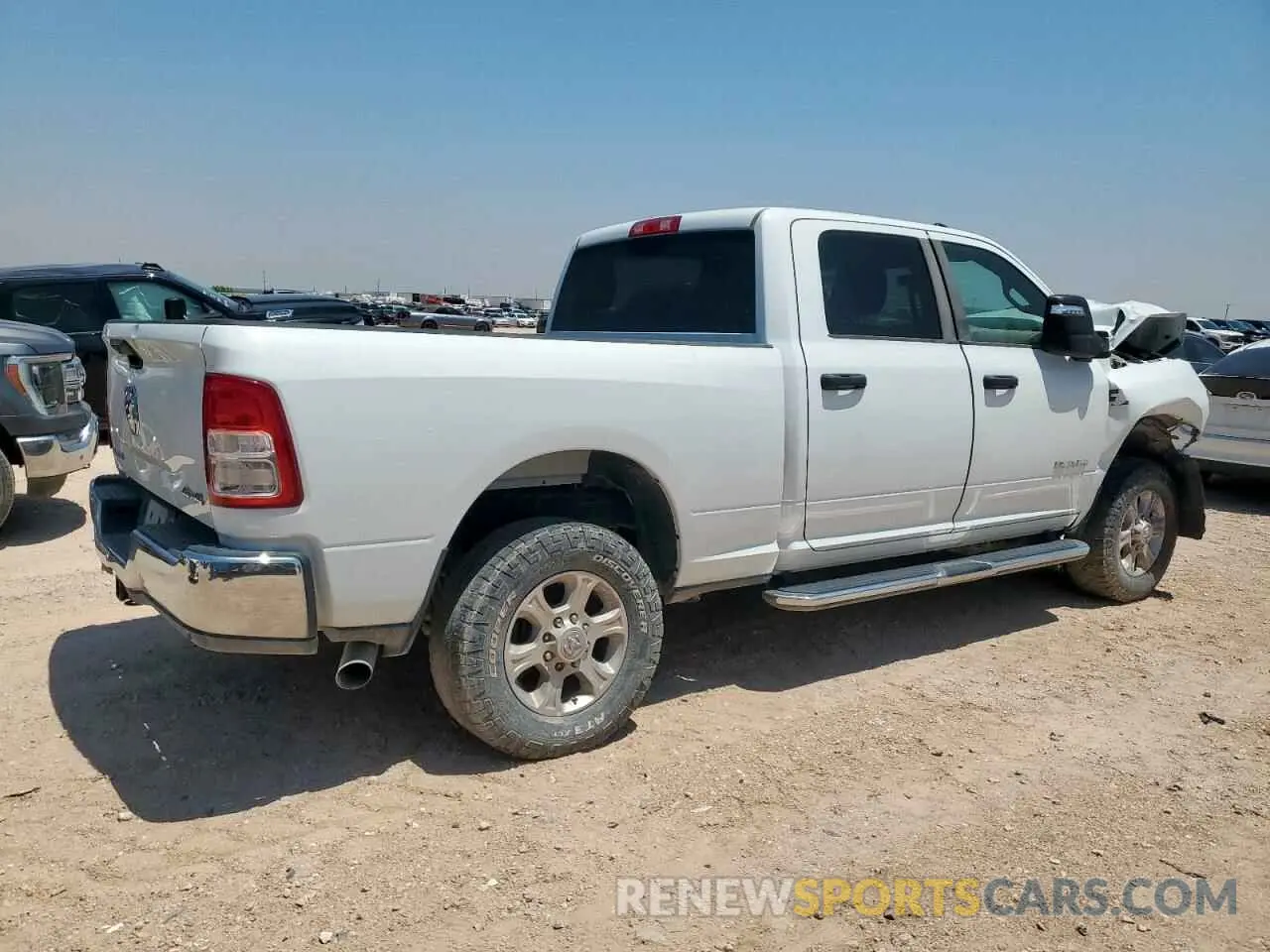 3 Photograph of a damaged car 3C6UR5DL6RG105991 RAM 2500 2024