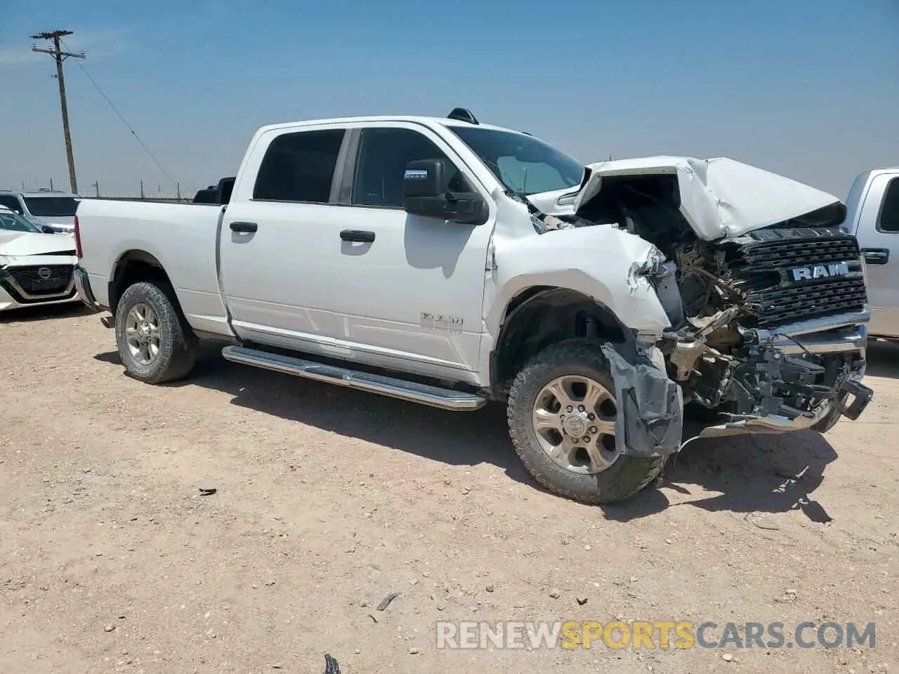 4 Photograph of a damaged car 3C6UR5DL6RG105991 RAM 2500 2024