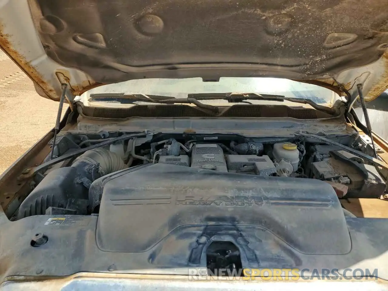 11 Photograph of a damaged car 3C6UR5DL6RG106266 RAM 2500 2024