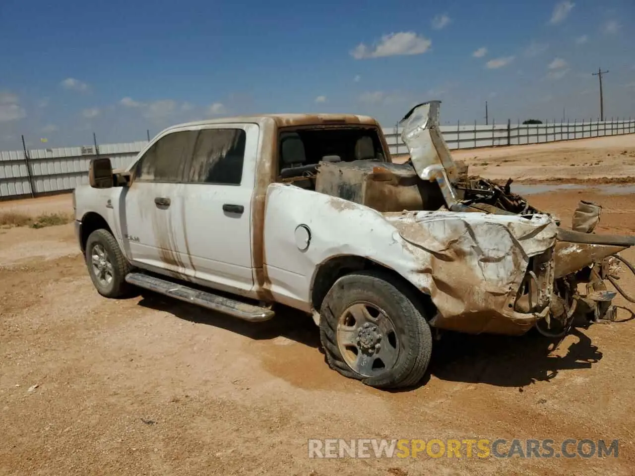2 Photograph of a damaged car 3C6UR5DL6RG106266 RAM 2500 2024