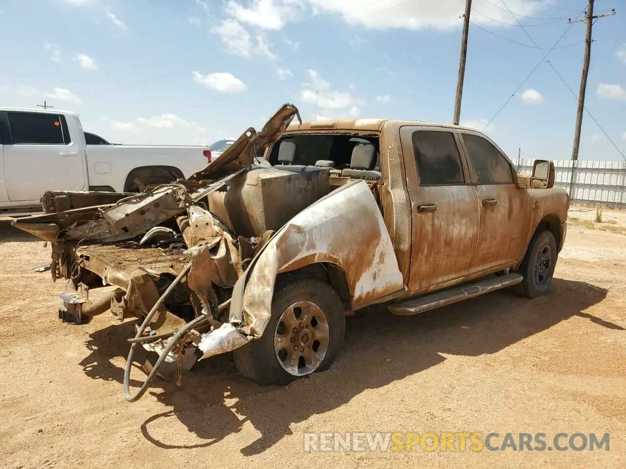 3 Photograph of a damaged car 3C6UR5DL6RG106266 RAM 2500 2024