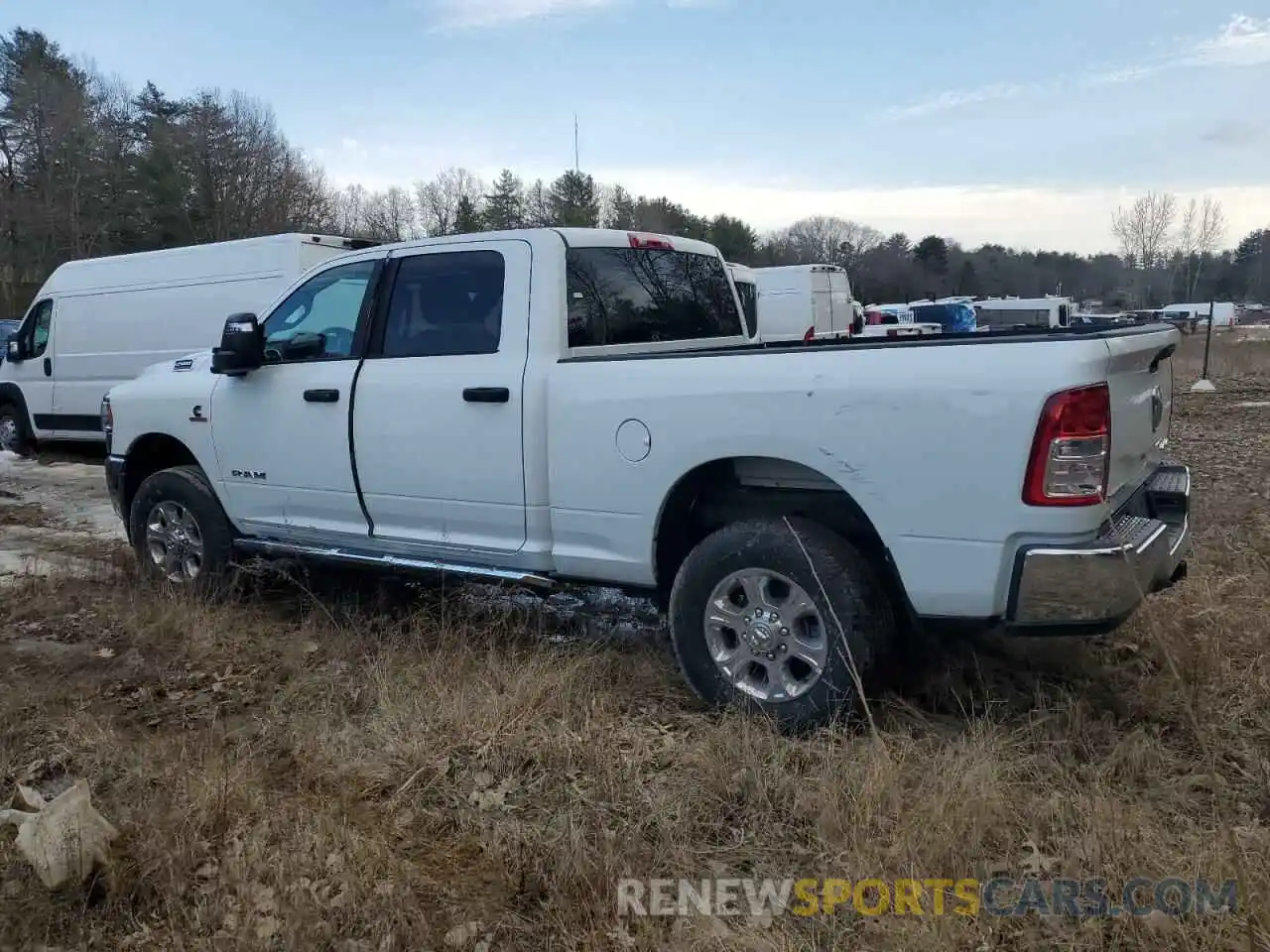 2 Photograph of a damaged car 3C6UR5DL6RG336518 RAM 2500 2024