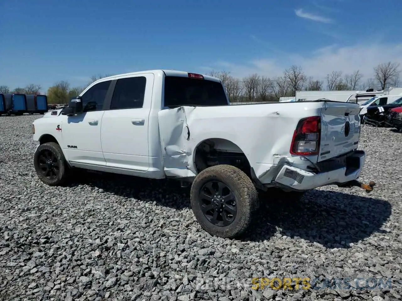 2 Photograph of a damaged car 3C6UR5DL7RG216615 RAM 2500 2024
