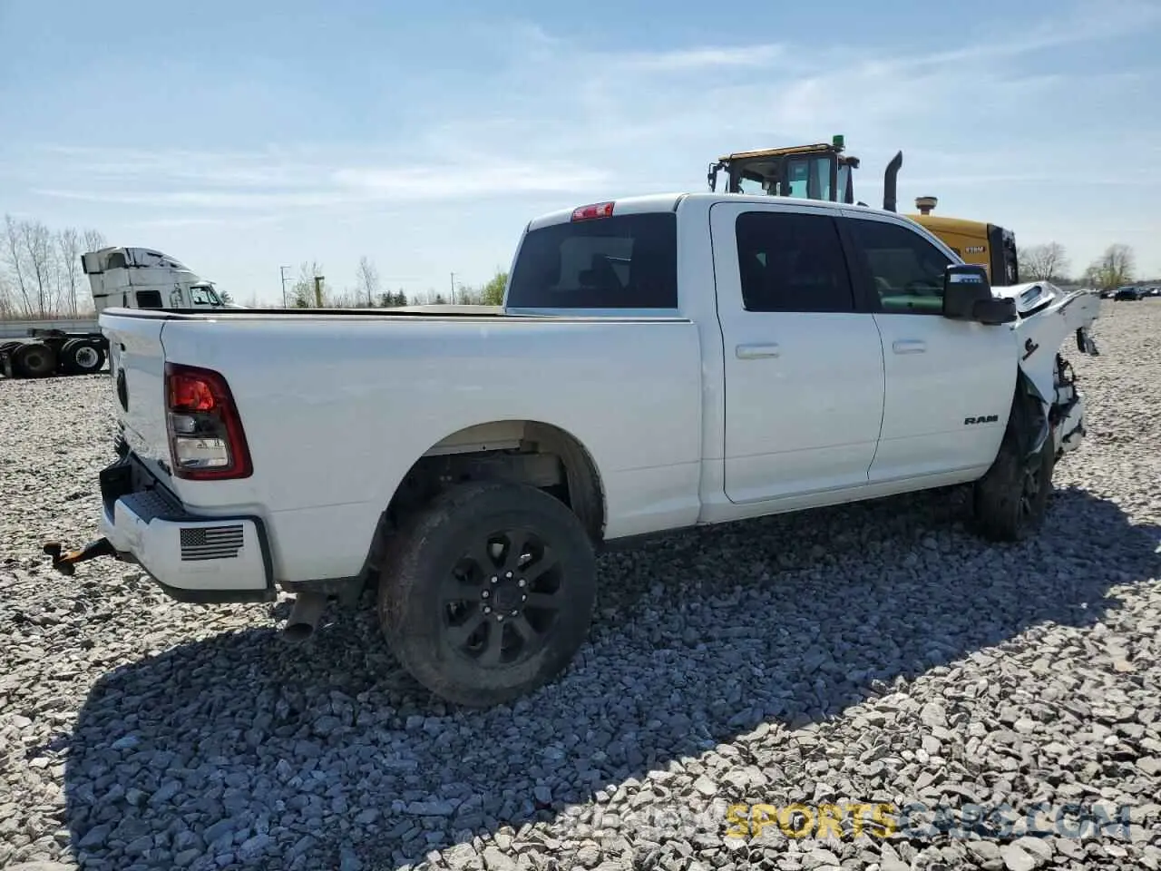 3 Photograph of a damaged car 3C6UR5DL7RG216615 RAM 2500 2024