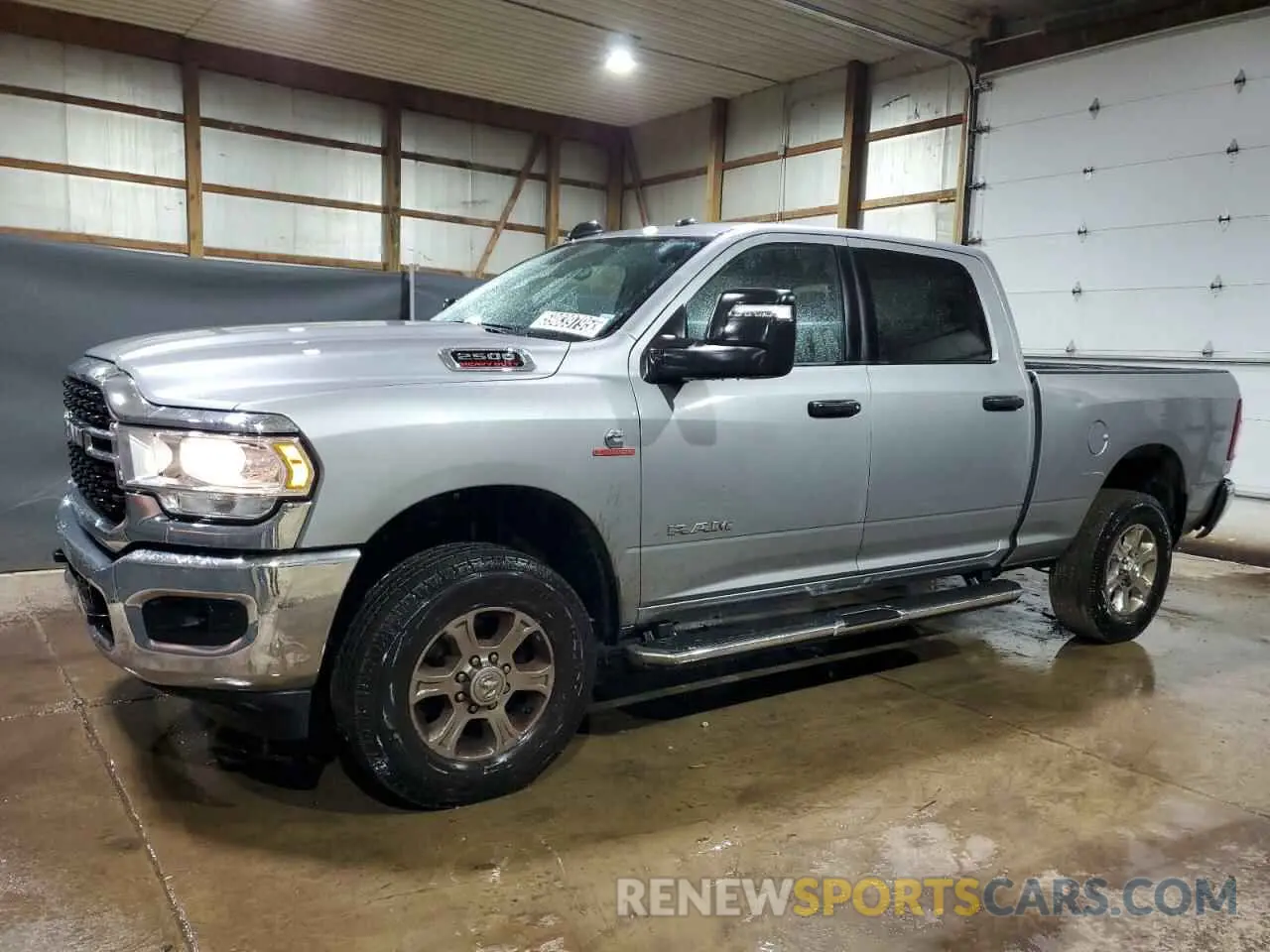 1 Photograph of a damaged car 3C6UR5DL7RG244706 RAM 2500 2024