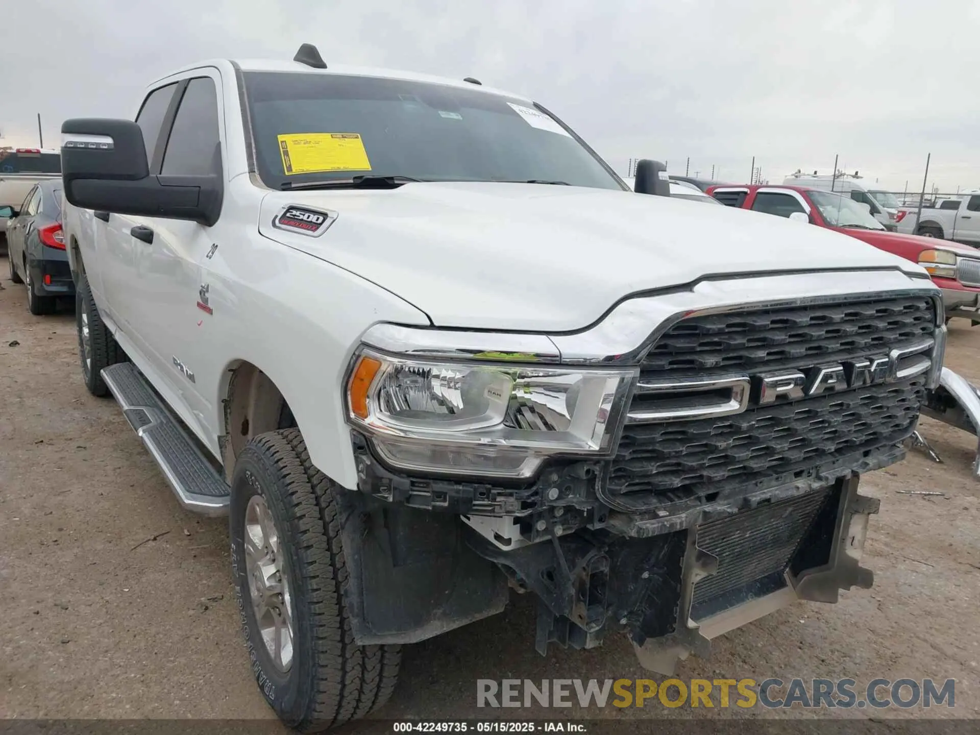 1 Photograph of a damaged car 3C6UR5DL8RG233858 RAM 2500 2024