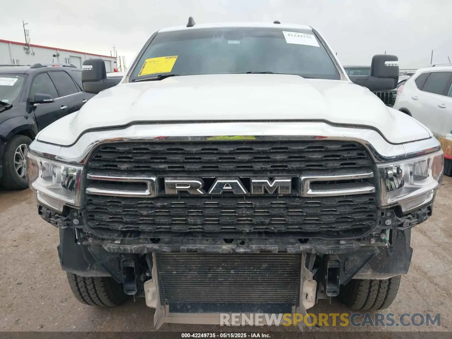 13 Photograph of a damaged car 3C6UR5DL8RG233858 RAM 2500 2024