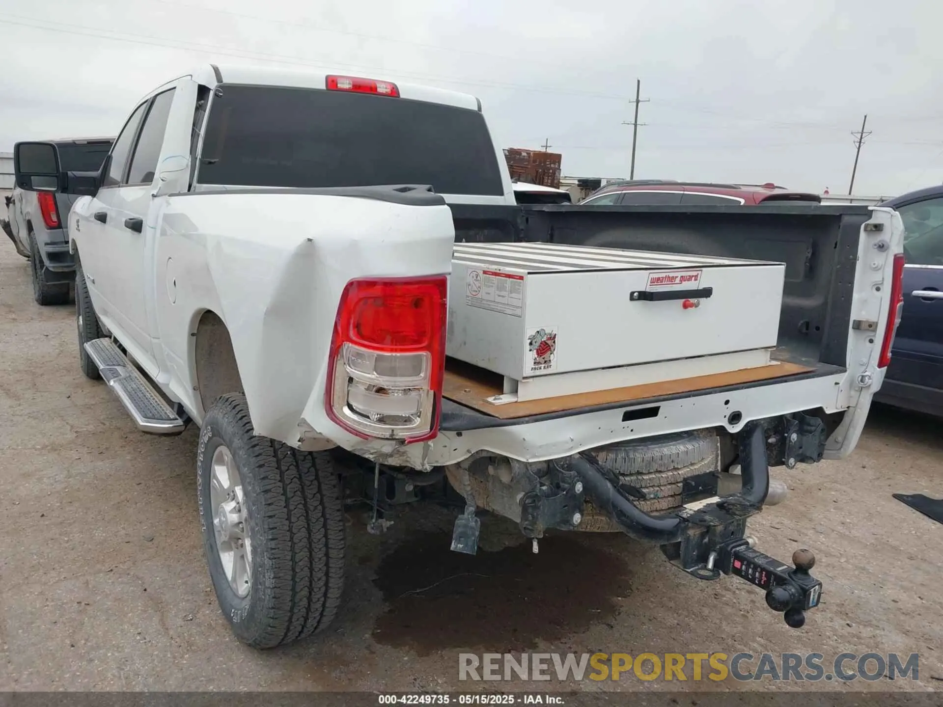3 Photograph of a damaged car 3C6UR5DL8RG233858 RAM 2500 2024