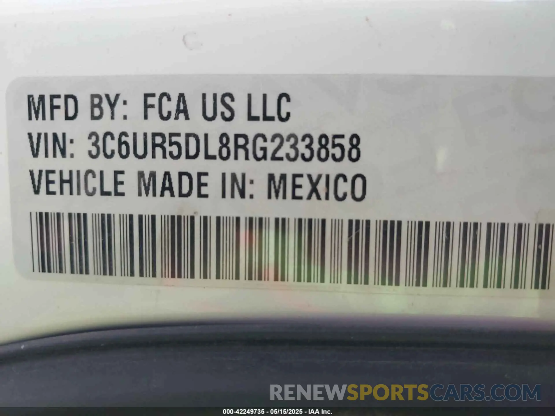 9 Photograph of a damaged car 3C6UR5DL8RG233858 RAM 2500 2024