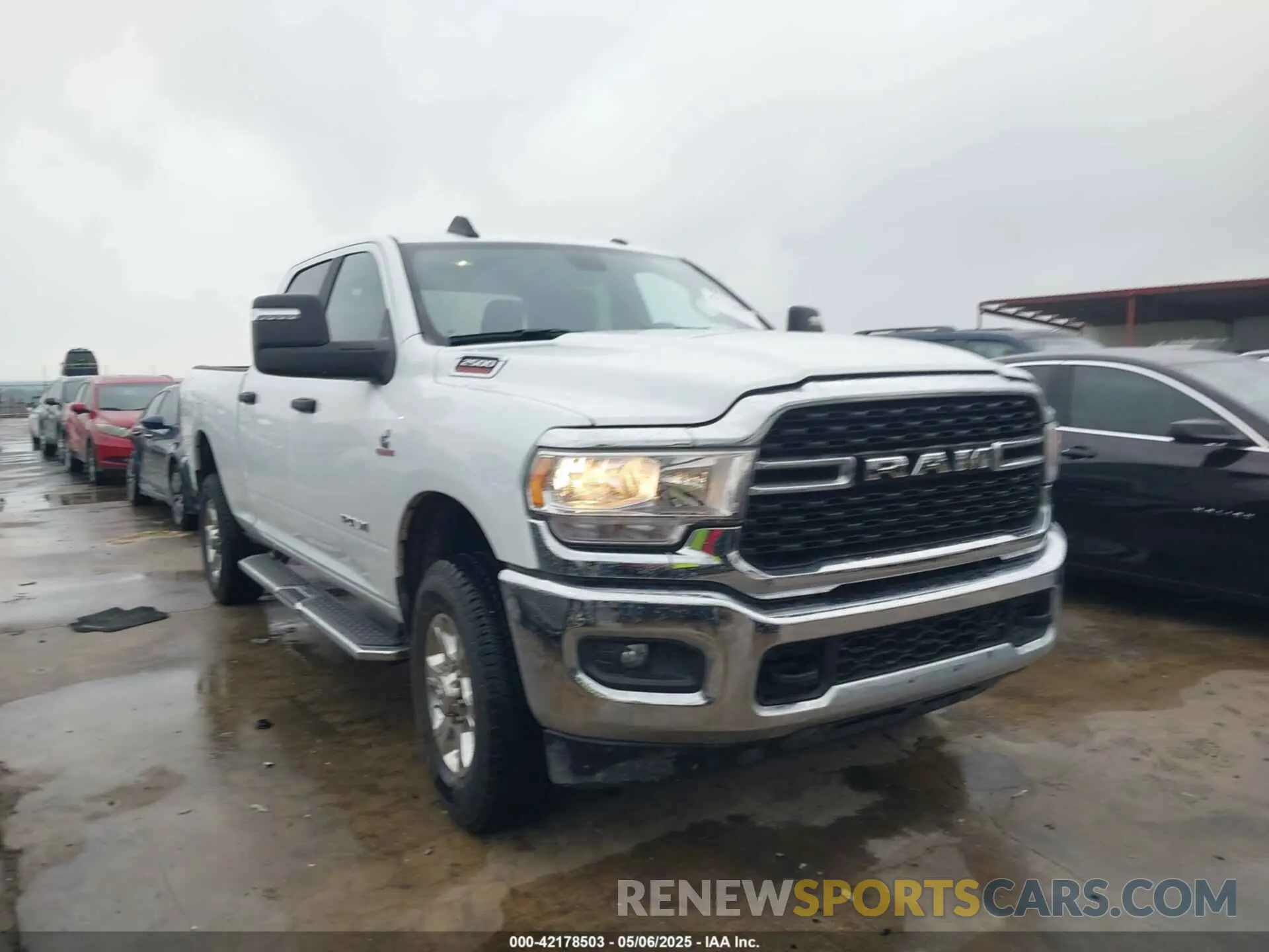 1 Photograph of a damaged car 3C6UR5DL8RG303908 RAM 2500 2024