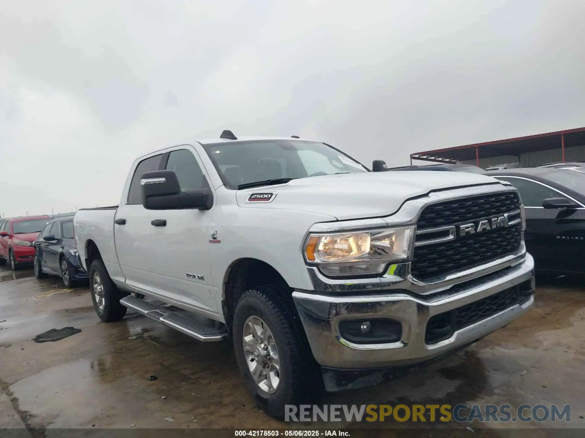13 Photograph of a damaged car 3C6UR5DL8RG303908 RAM 2500 2024