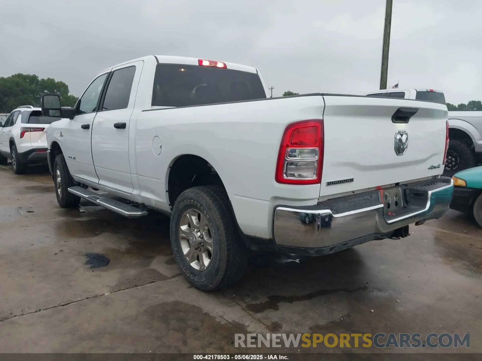 14 Photograph of a damaged car 3C6UR5DL8RG303908 RAM 2500 2024
