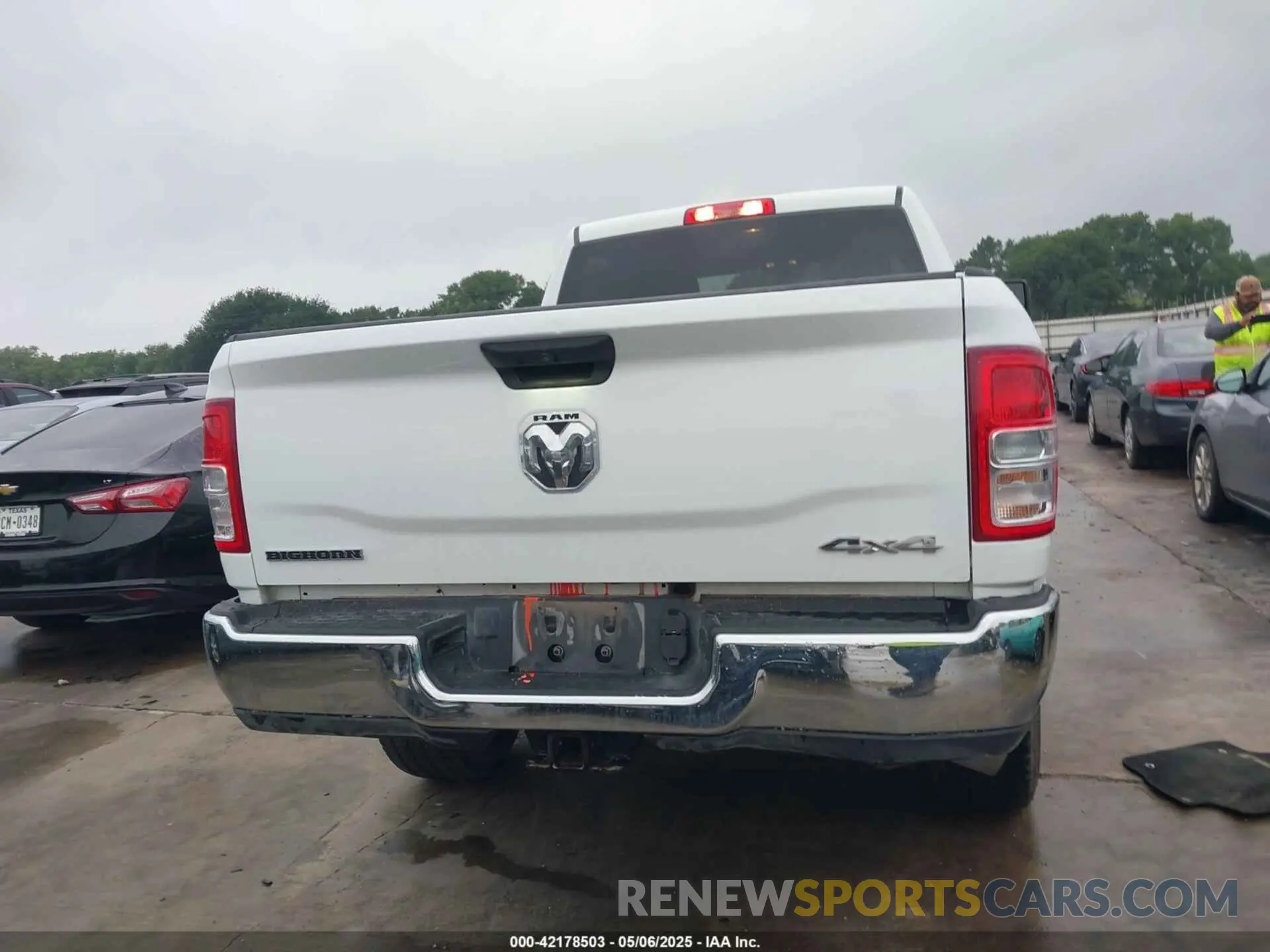 16 Photograph of a damaged car 3C6UR5DL8RG303908 RAM 2500 2024