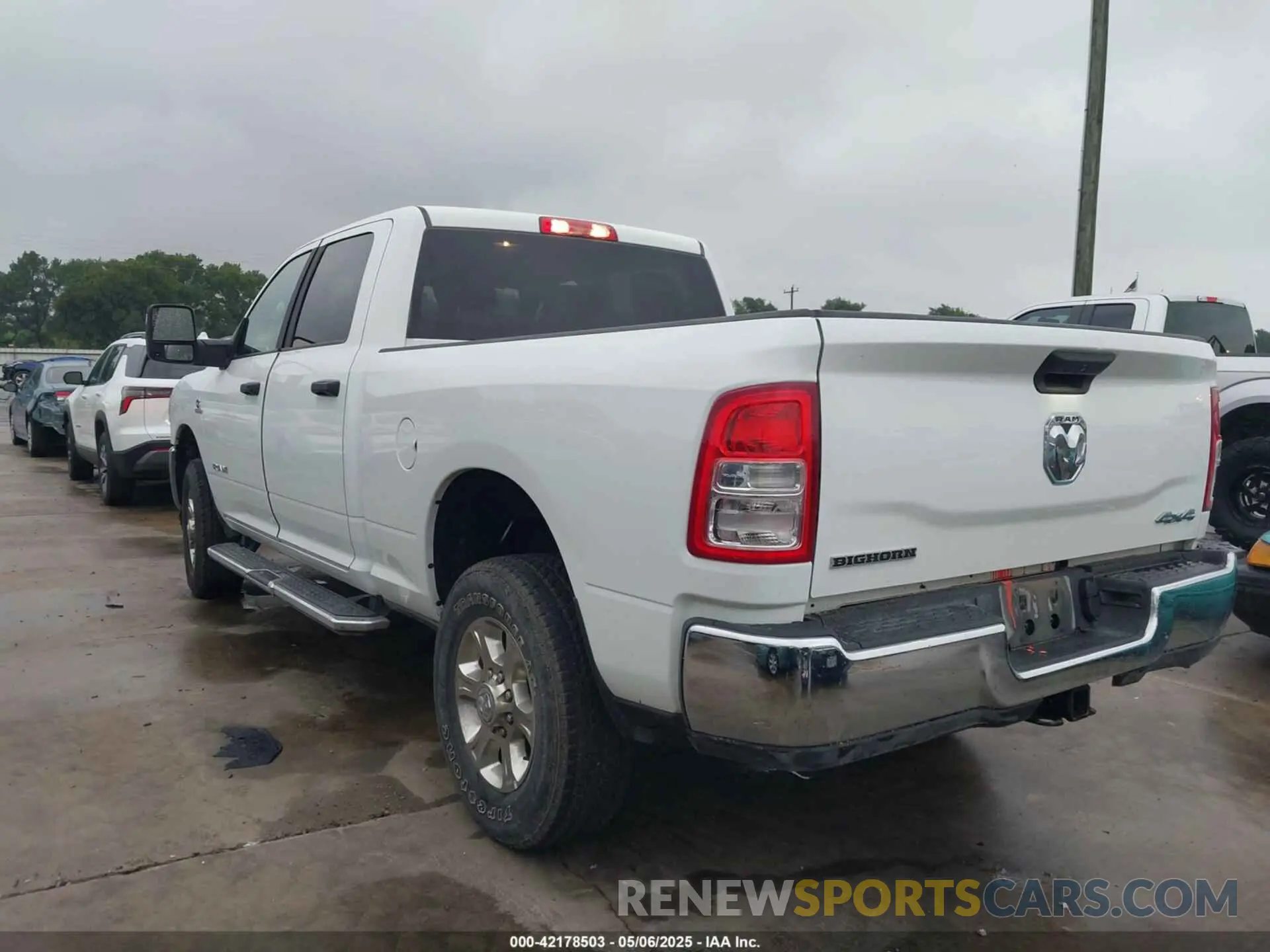 3 Photograph of a damaged car 3C6UR5DL8RG303908 RAM 2500 2024