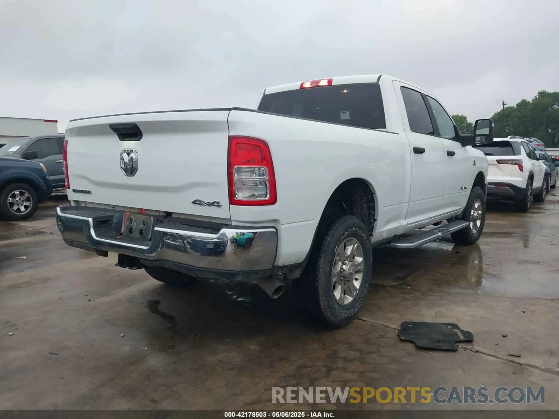 4 Photograph of a damaged car 3C6UR5DL8RG303908 RAM 2500 2024