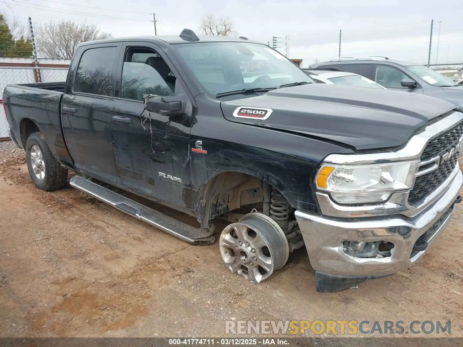 1 Photograph of a damaged car 3C6UR5DL8RG313936 RAM 2500 2024