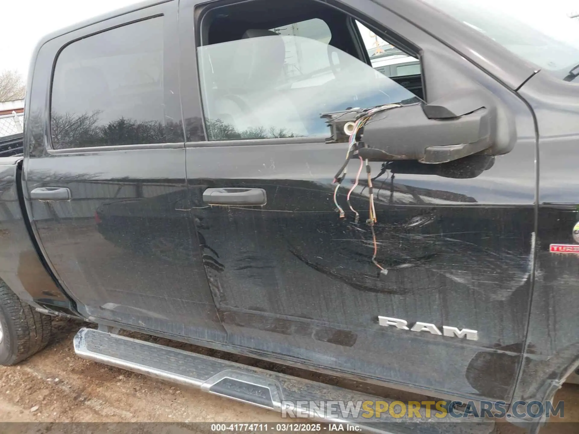 14 Photograph of a damaged car 3C6UR5DL8RG313936 RAM 2500 2024