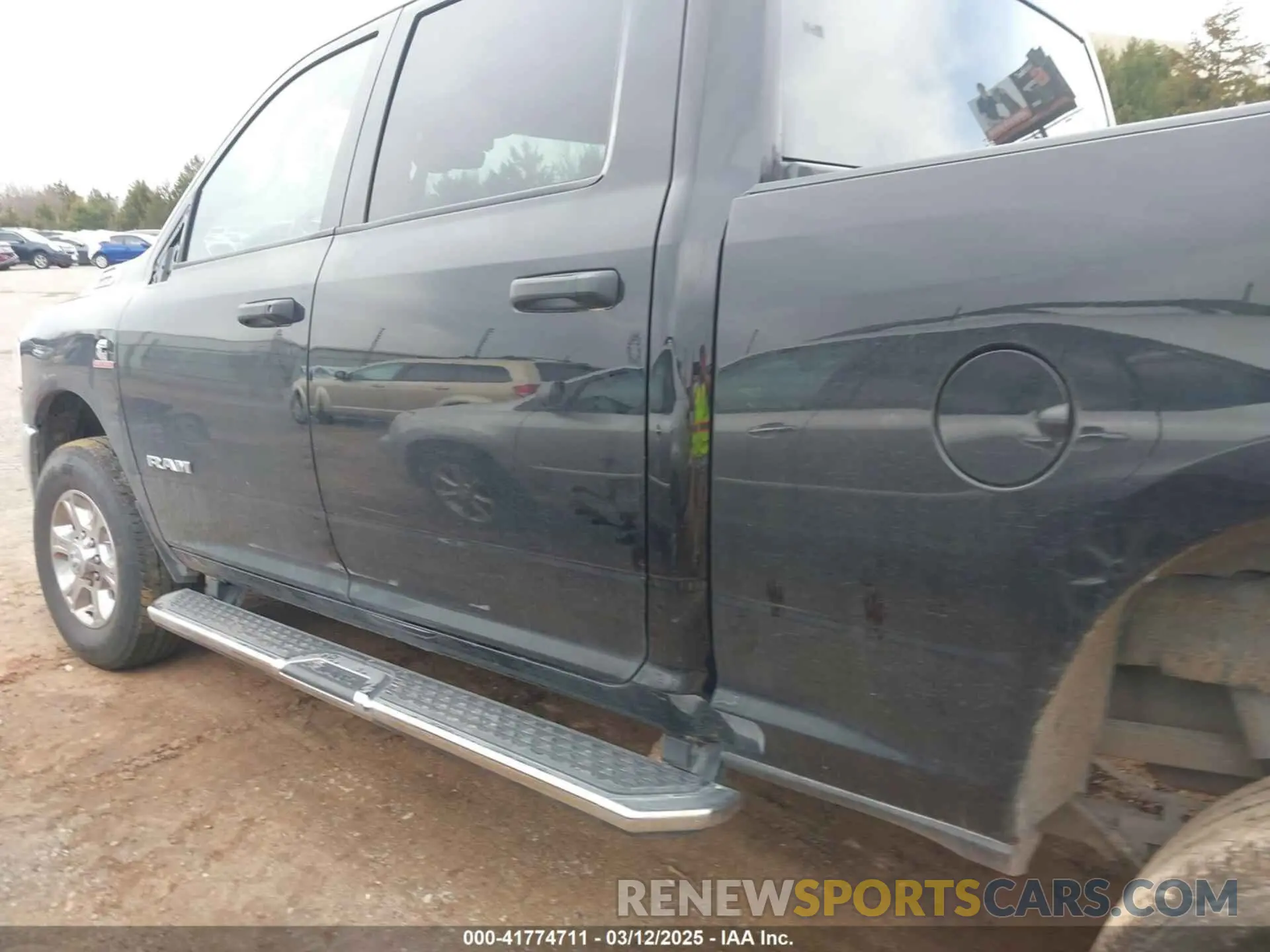 15 Photograph of a damaged car 3C6UR5DL8RG313936 RAM 2500 2024