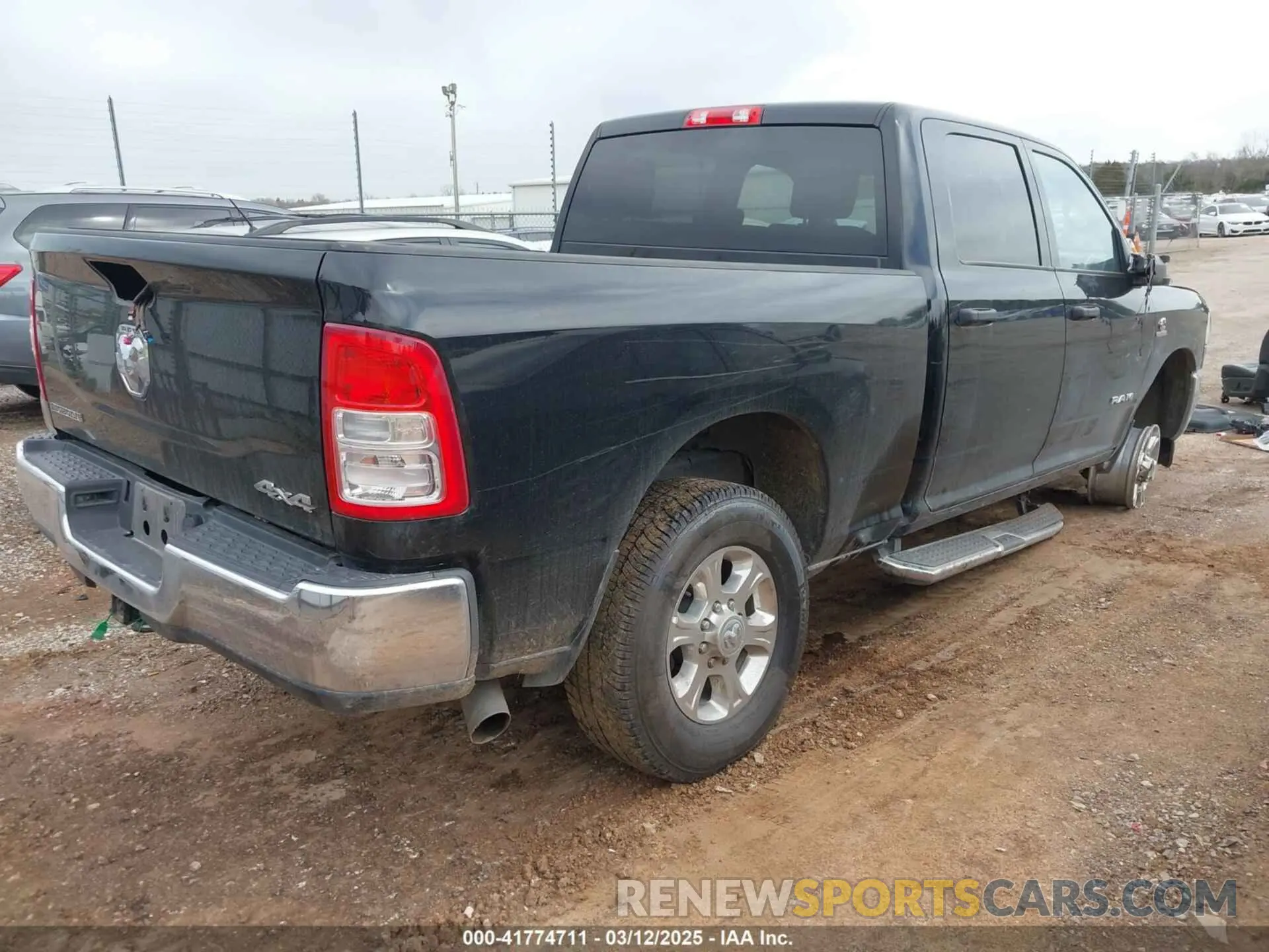 4 Photograph of a damaged car 3C6UR5DL8RG313936 RAM 2500 2024