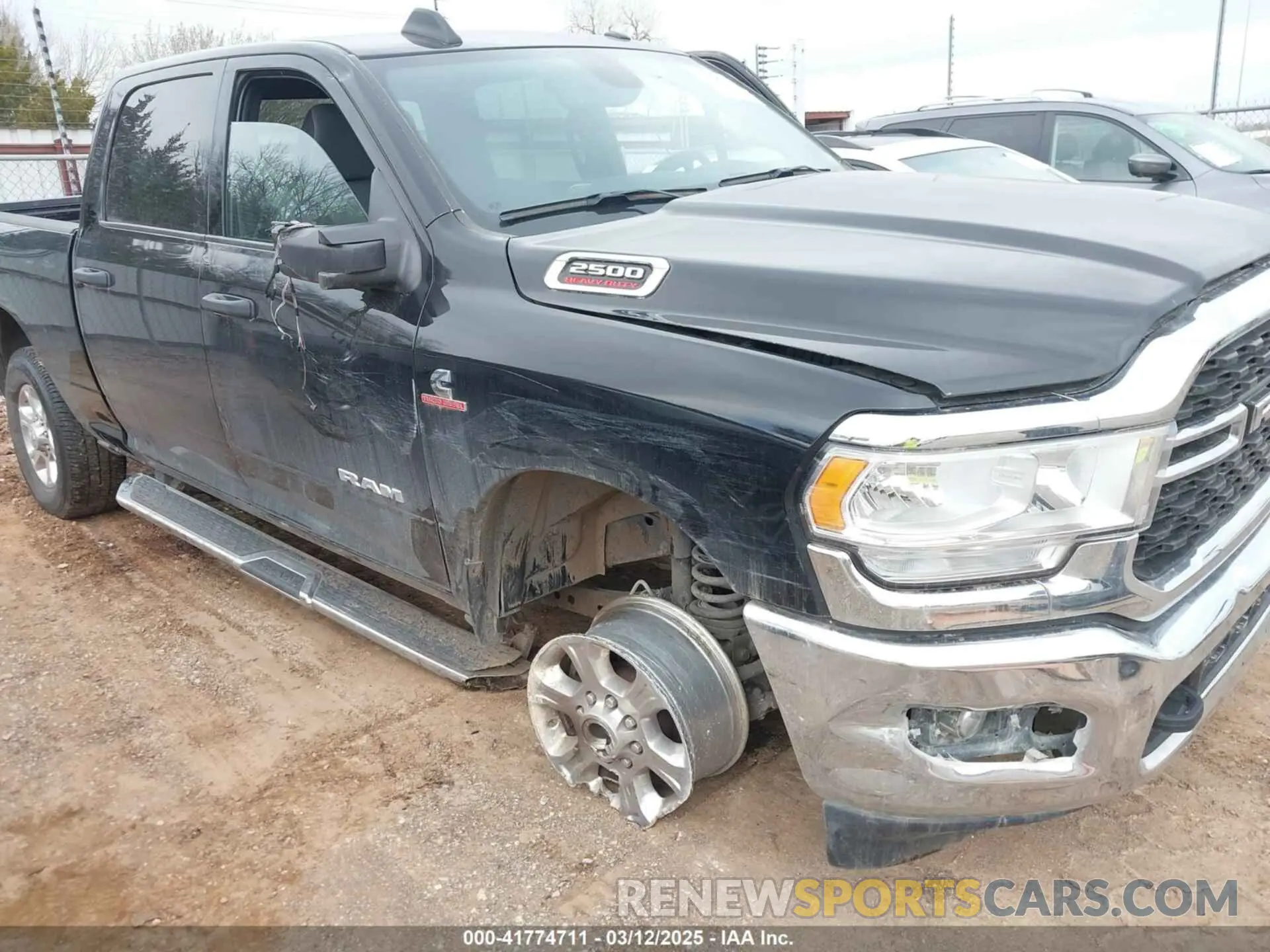 6 Photograph of a damaged car 3C6UR5DL8RG313936 RAM 2500 2024